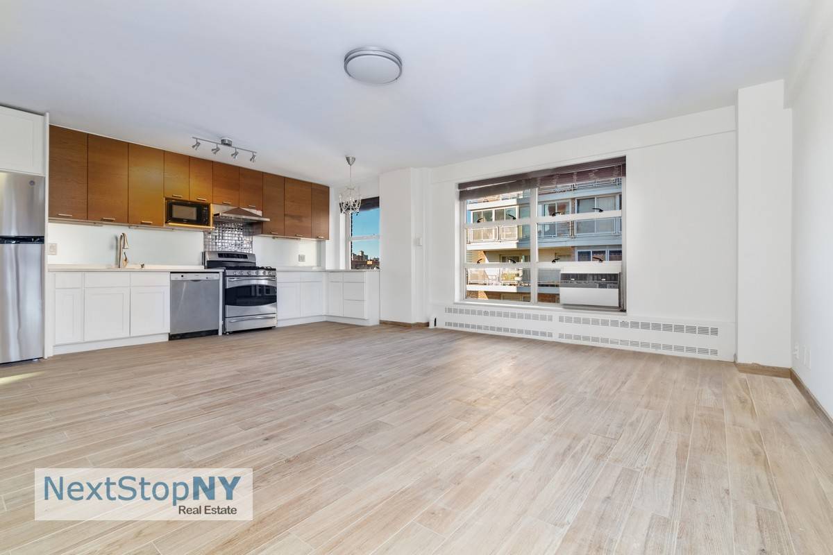Come home to this newly painted and renovated 2 bedroom with an open floor plan and huge windows showing off the great natural light and the landscaped gardens.