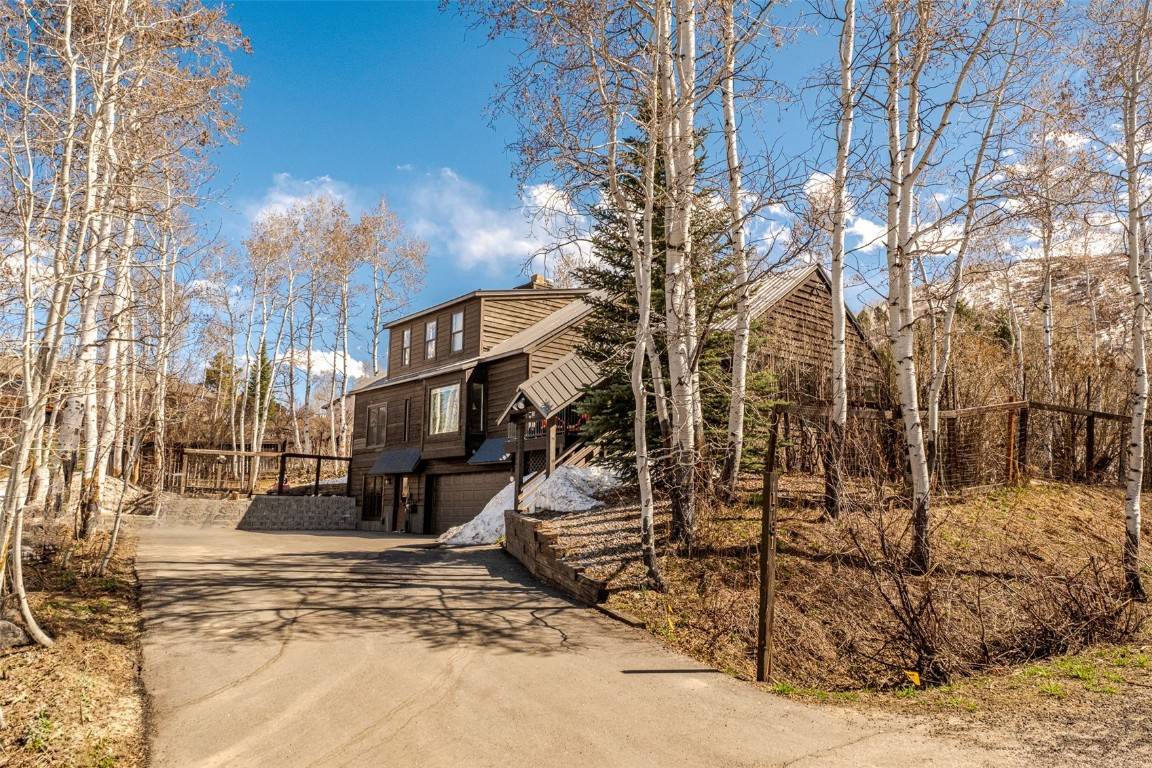 Nestled on a quiet end lot at the top of Alexandre Way in the Fish Creek neighborhood, this stunning property boasts unparalleled craftsmanship and modern amenities throughout.