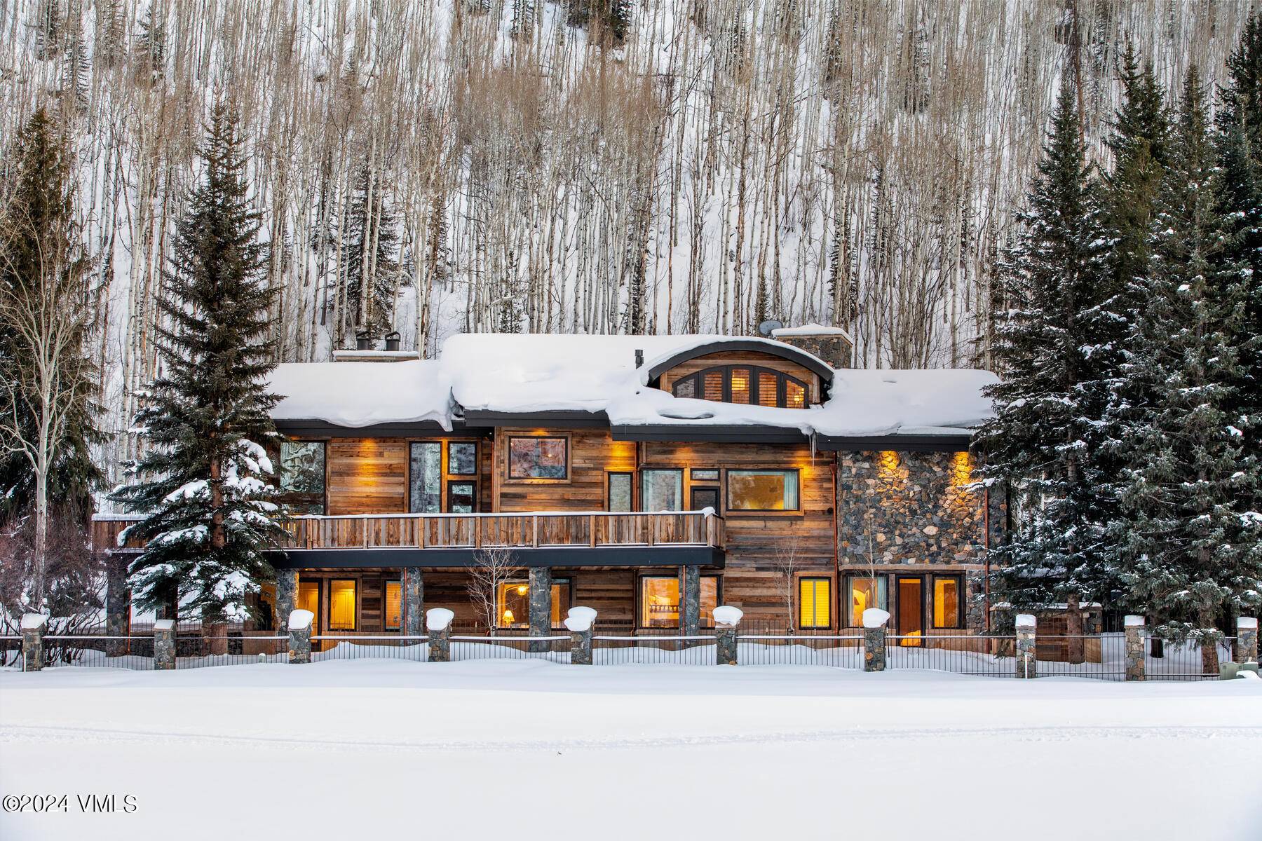 Unique and spectacular, this iconic Vail estate boasts one of the most coveted settings in the area, on the golf course with commanding views of the Gore Range, and across ...