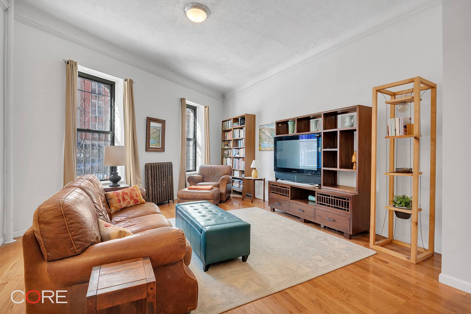 Welcome to apartment 1, a two bedroom convertible to three, one a half bath HDFC co op in Harlem.