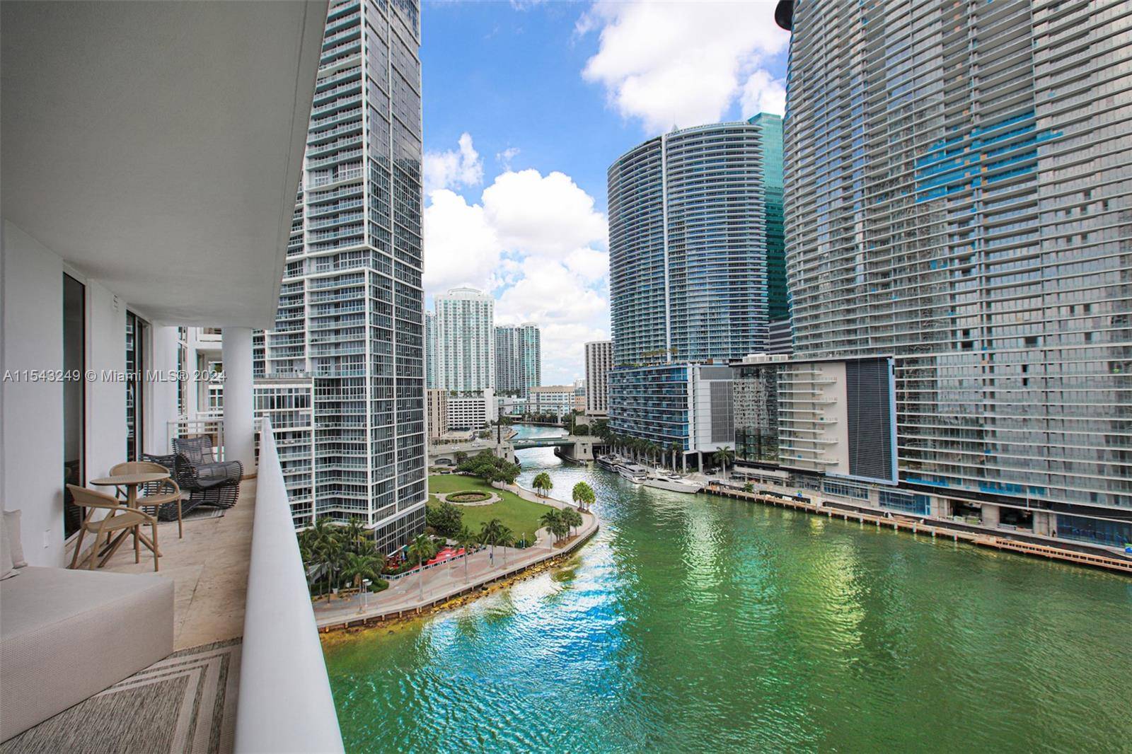 Beautiful bright, clean, freshly upgraded unit, with direct water views in the exclusive Island of Brickell Key.