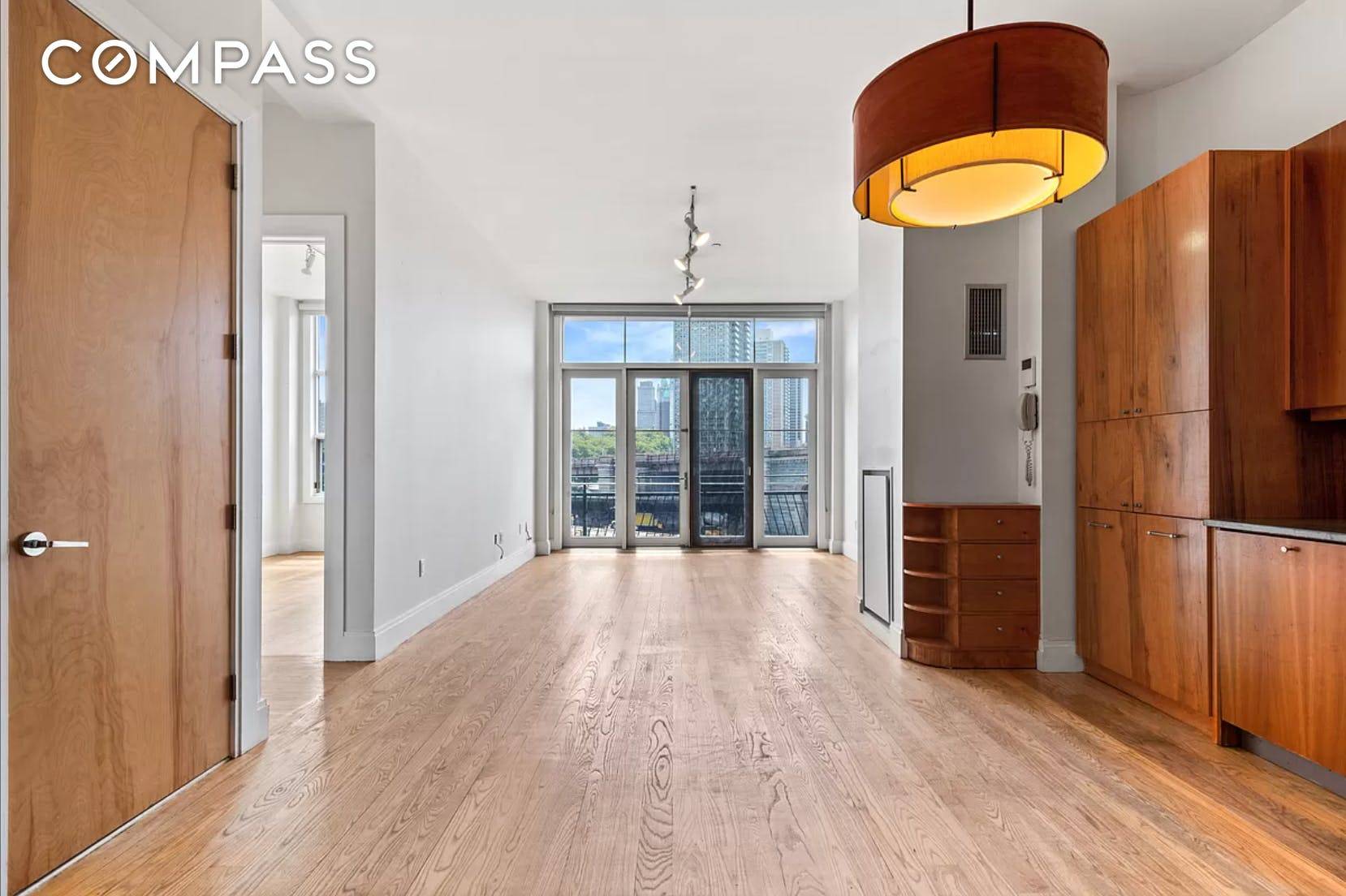 New No Fee Dumbo Loft ! Enjoy the splendor in this spectacularly bright two bedroom, two bathroom condominium with private balcony.