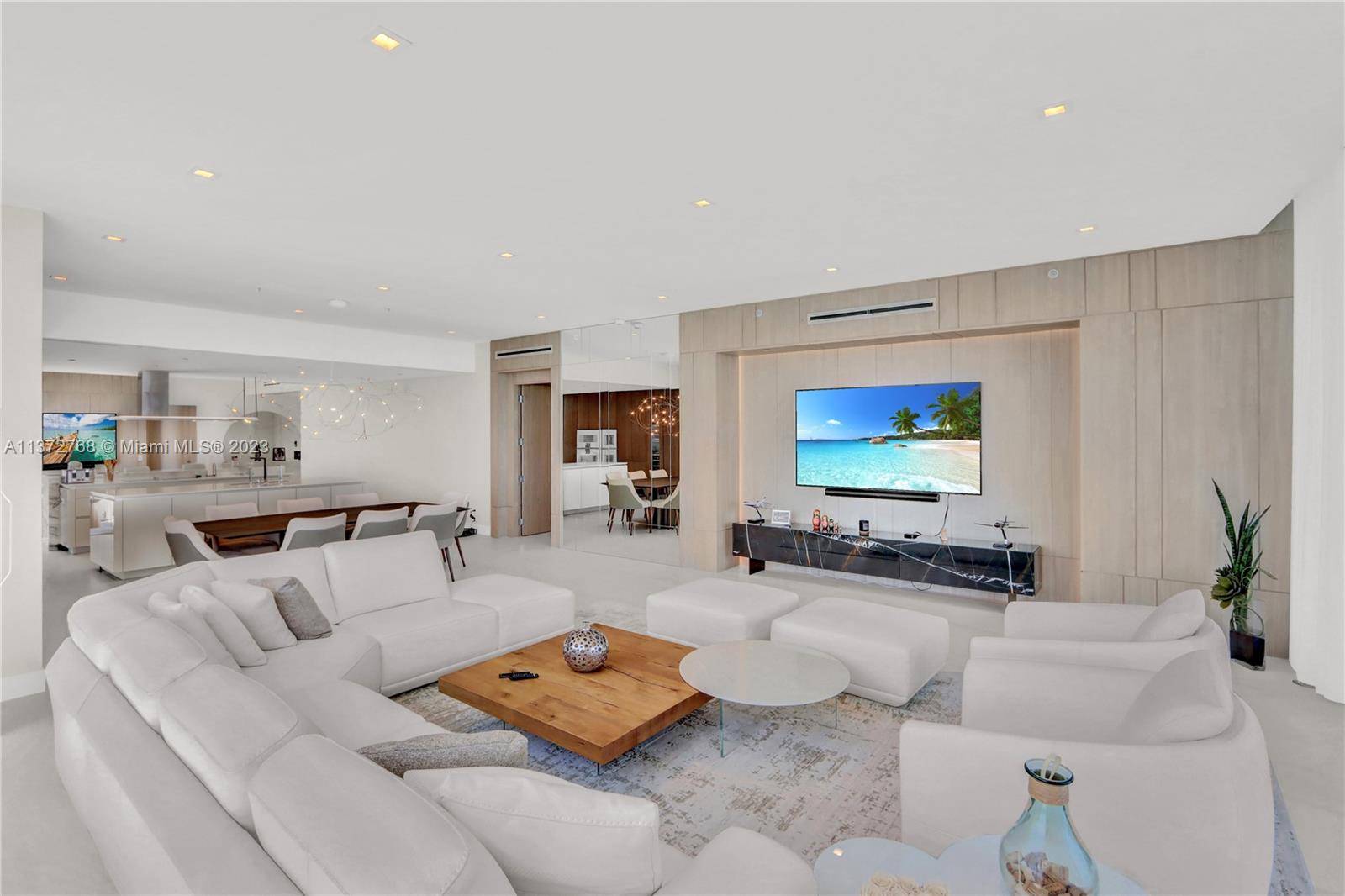 Spectacular residence showcasing a flawless contemporary design style exemplifying the ultimate Miami luxury lifestyle.