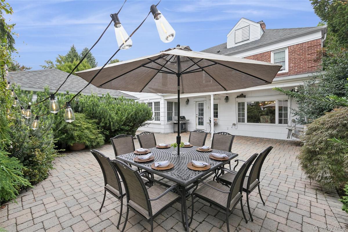 Huge back patio is perfect for alfresco dining