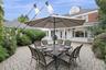 Huge back patio is perfect for alfresco dining