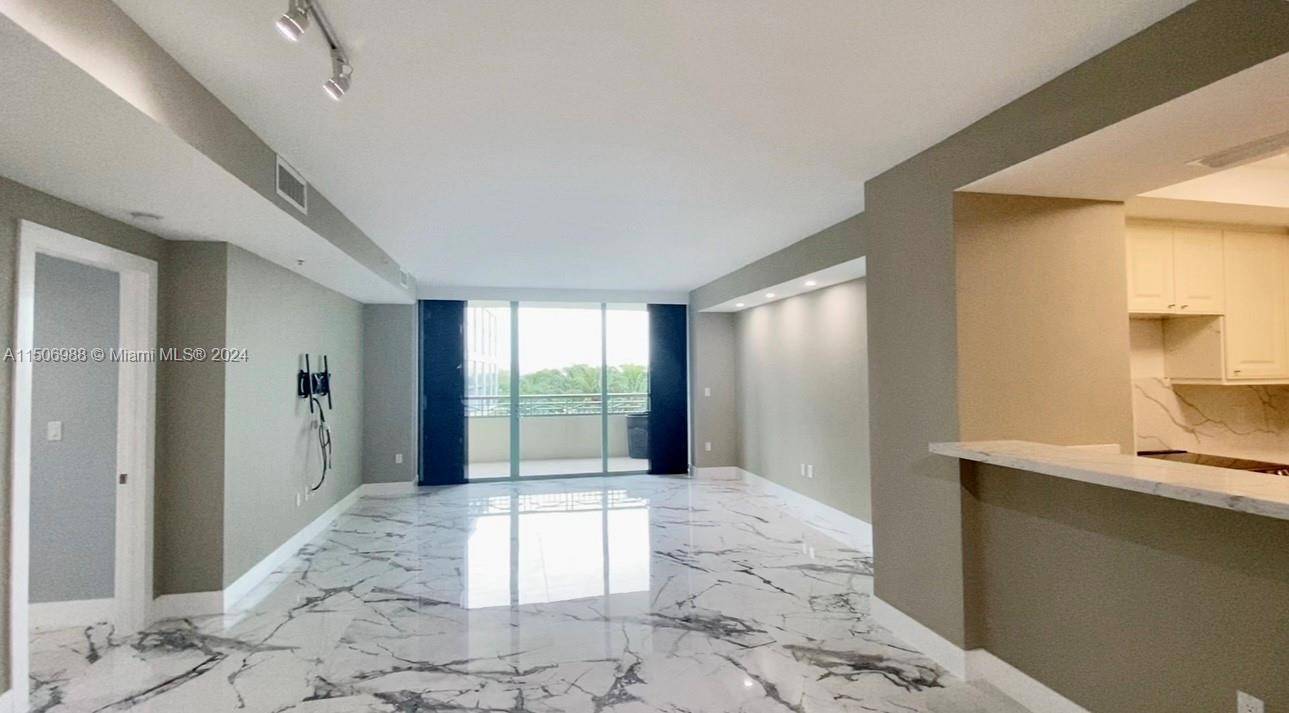 A unique opportunity to own a custom and fully renovated two bedroom home at the exclusive Ritz Carlton Tower Residences.