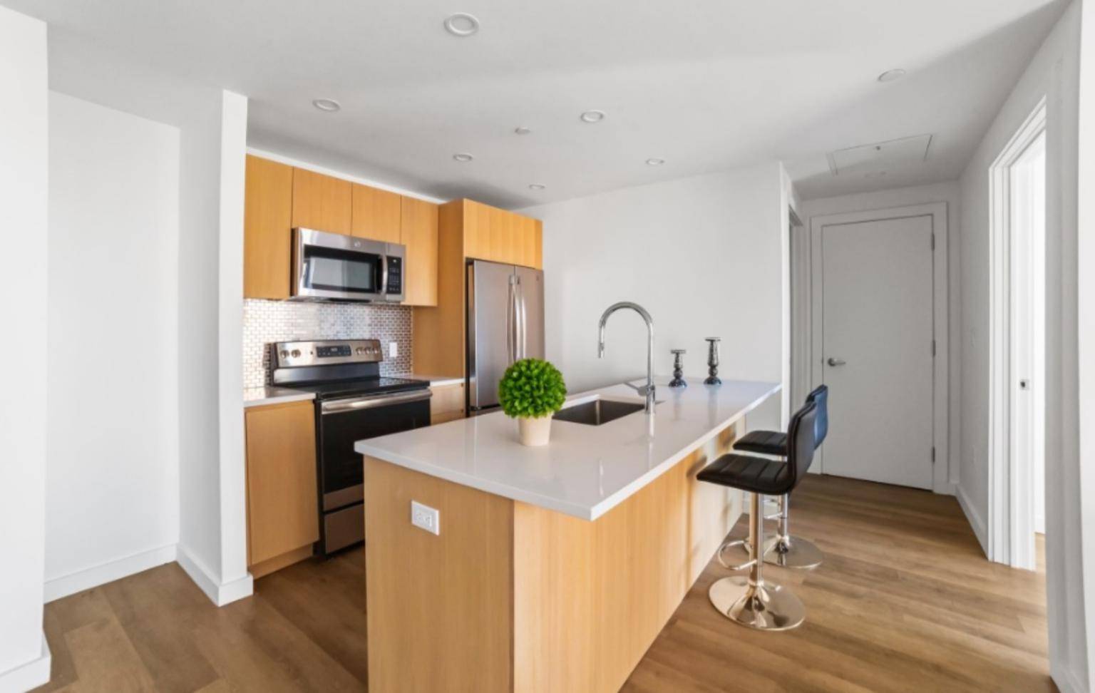 Large 2 bed, 2 bathroom with split floor plan, natural light and features an in unit washer dryer, expansive chefs kitchen, subway tiled bathroom, large windows allowing endless sunlight, and ...