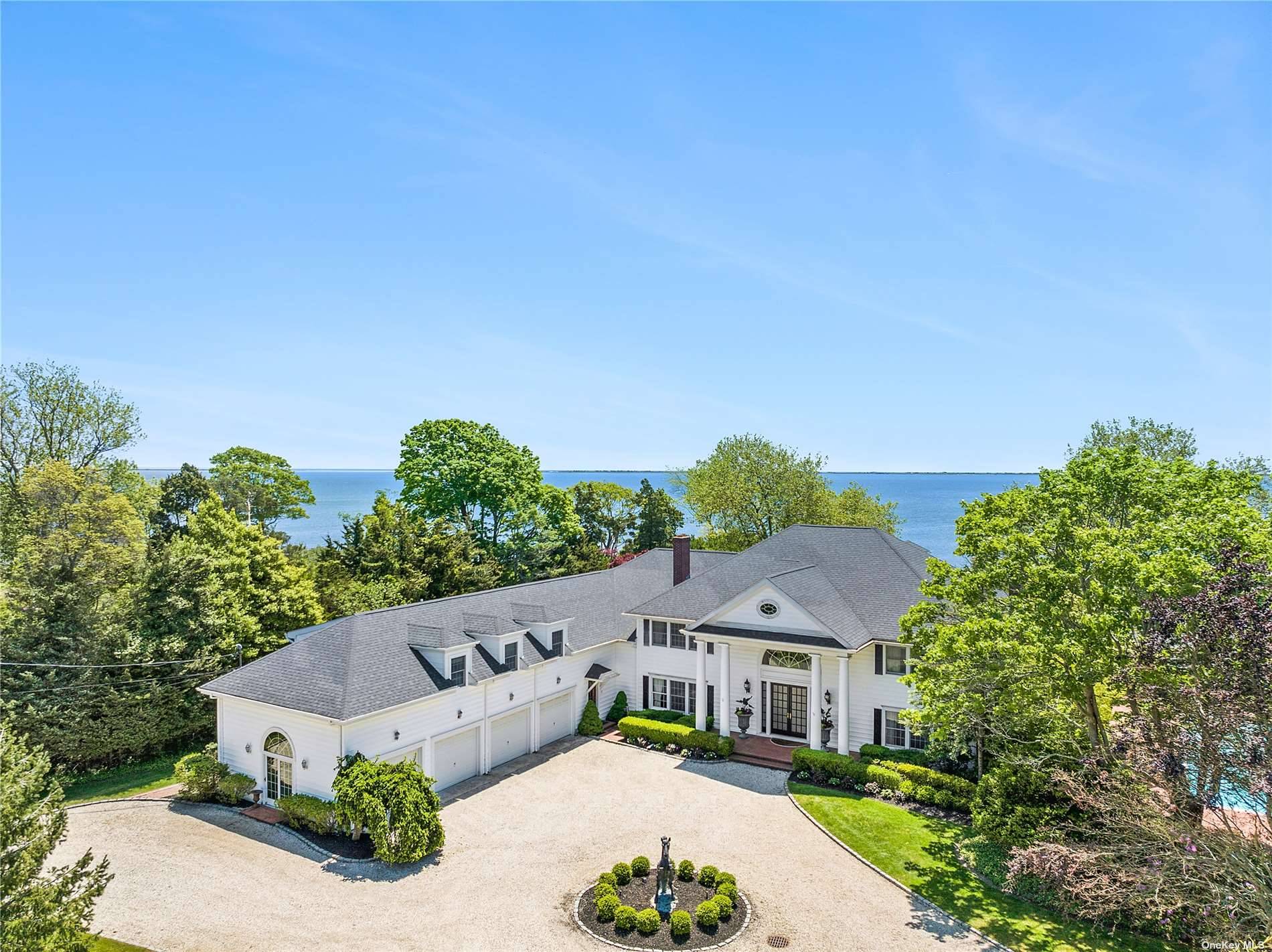 Welcome to Bay Breeze, the stunning waterfront estate in the Village of Bellport.