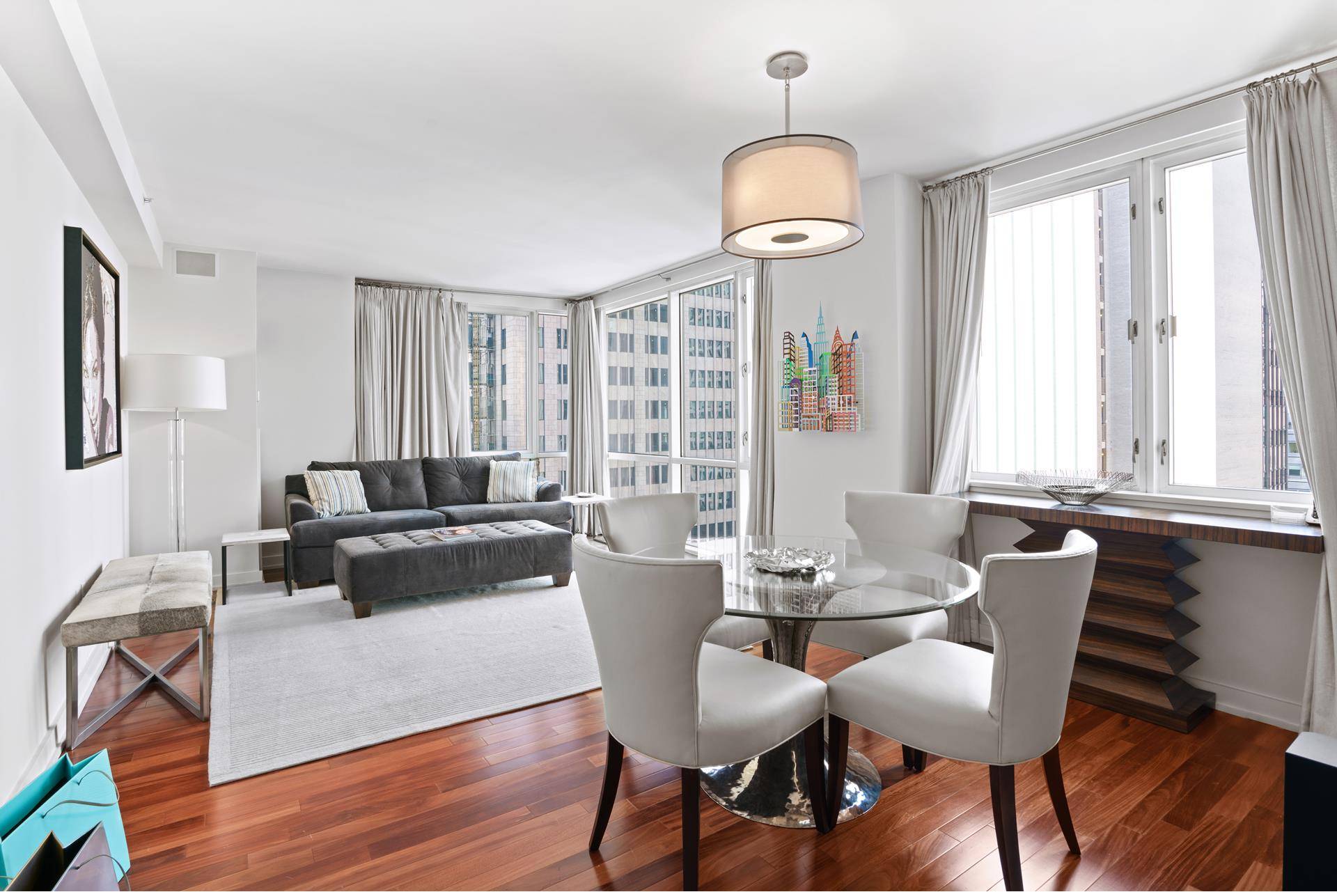 FULLY FURNISED ! This spectacular high floor, beautiful, mint condition, one bedroom corner apartment, Located in the heard of mid town Manhattan.