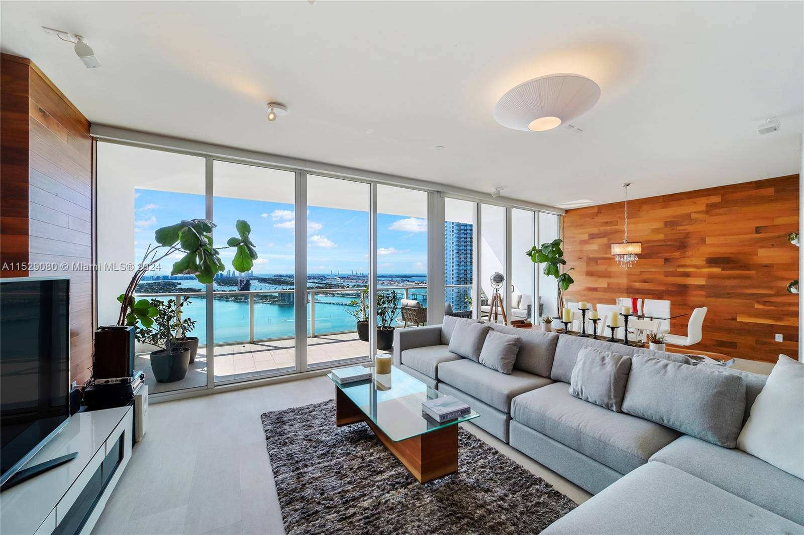 Available April 1st Stunning 4bed 5bath den Movie room with breath taking views of the Bay and the Ocean in an impeccable building, Paramount Bay.