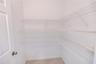 Third floor guest suite with spacious closets and a serene ensuite bath.