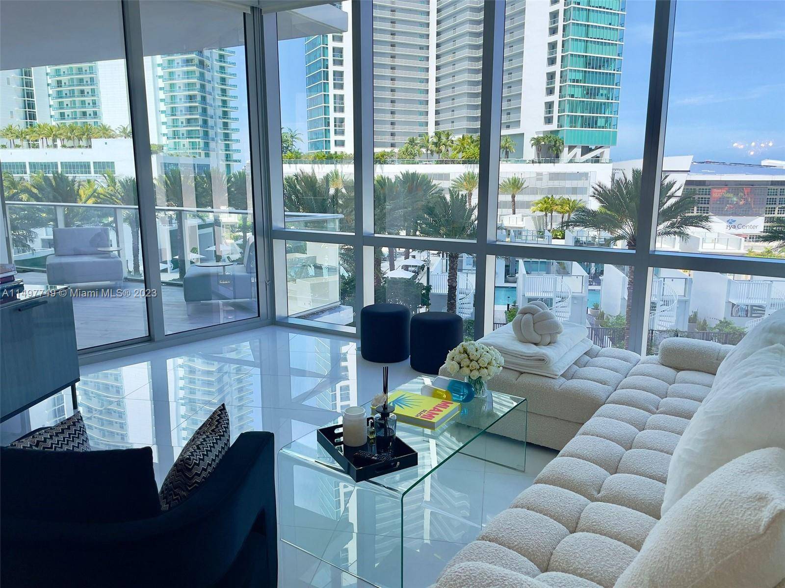 Immerse in the epitome of luxury in this professionally furnished 2 bed plus den, 3 bath residence at the acclaimed Paramount Miami Worldcenter.