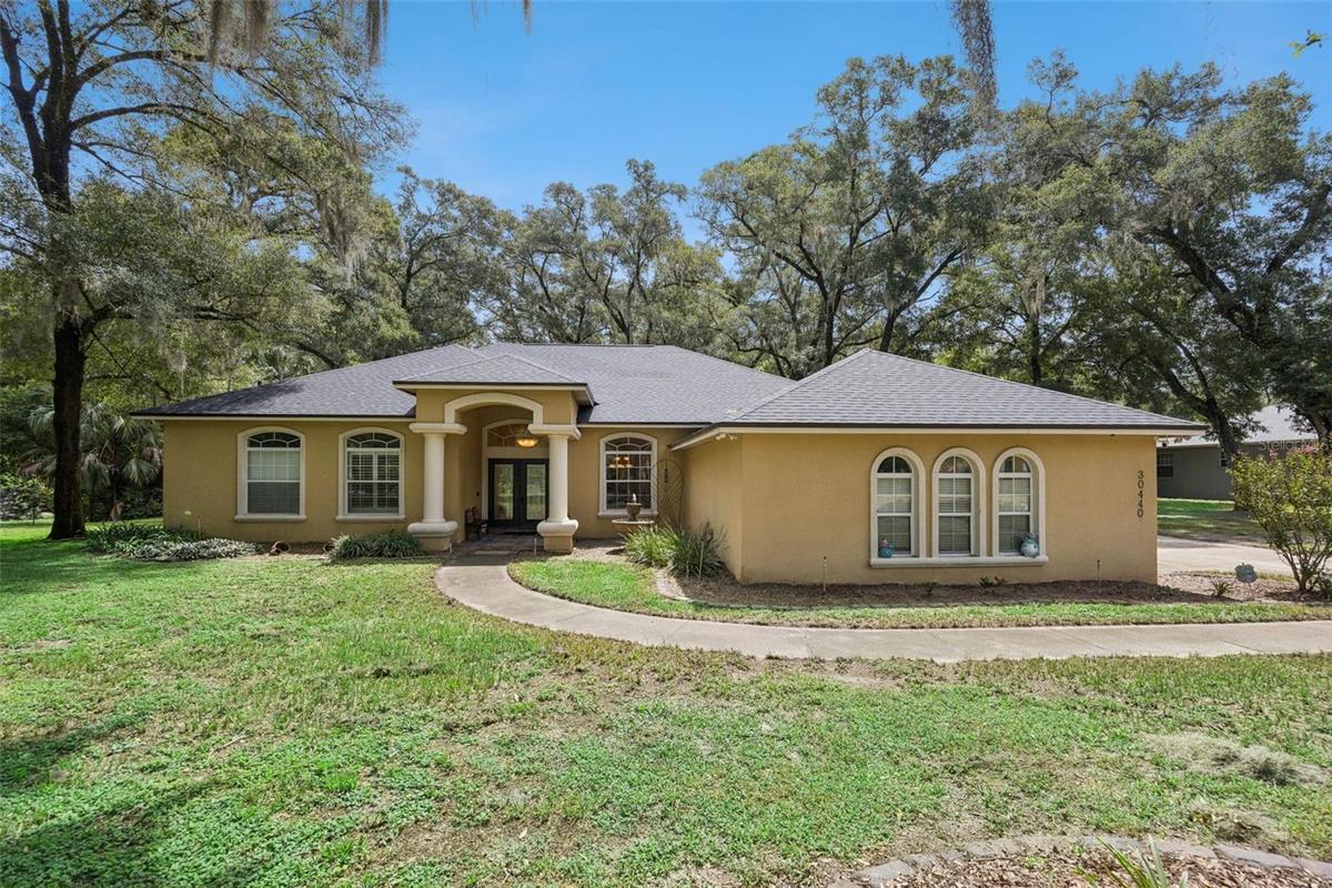 Welcome to 30440 Jubilee Way, a 4-bedroom, 3.5-bath pool home on 1.14 acres in Sorrento.