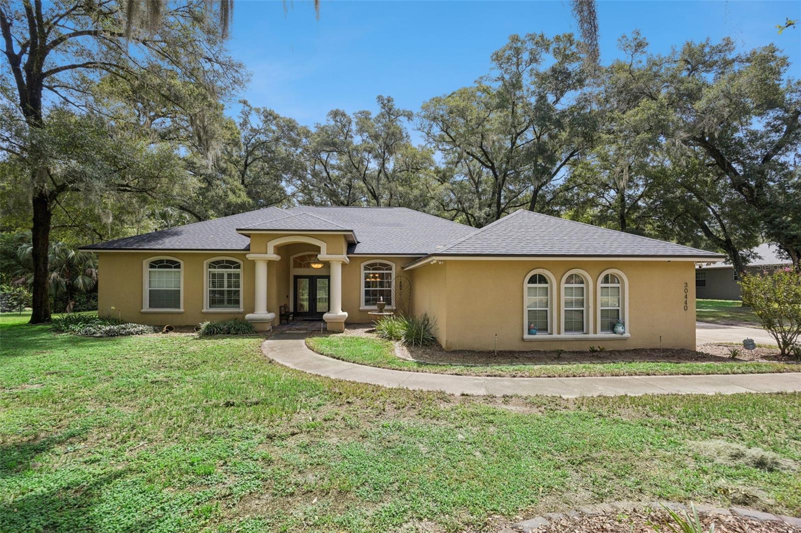 Welcome to 30440 Jubilee Way, a 4-bedroom, 3.5-bath pool home on 1.14 acres in Sorrento.