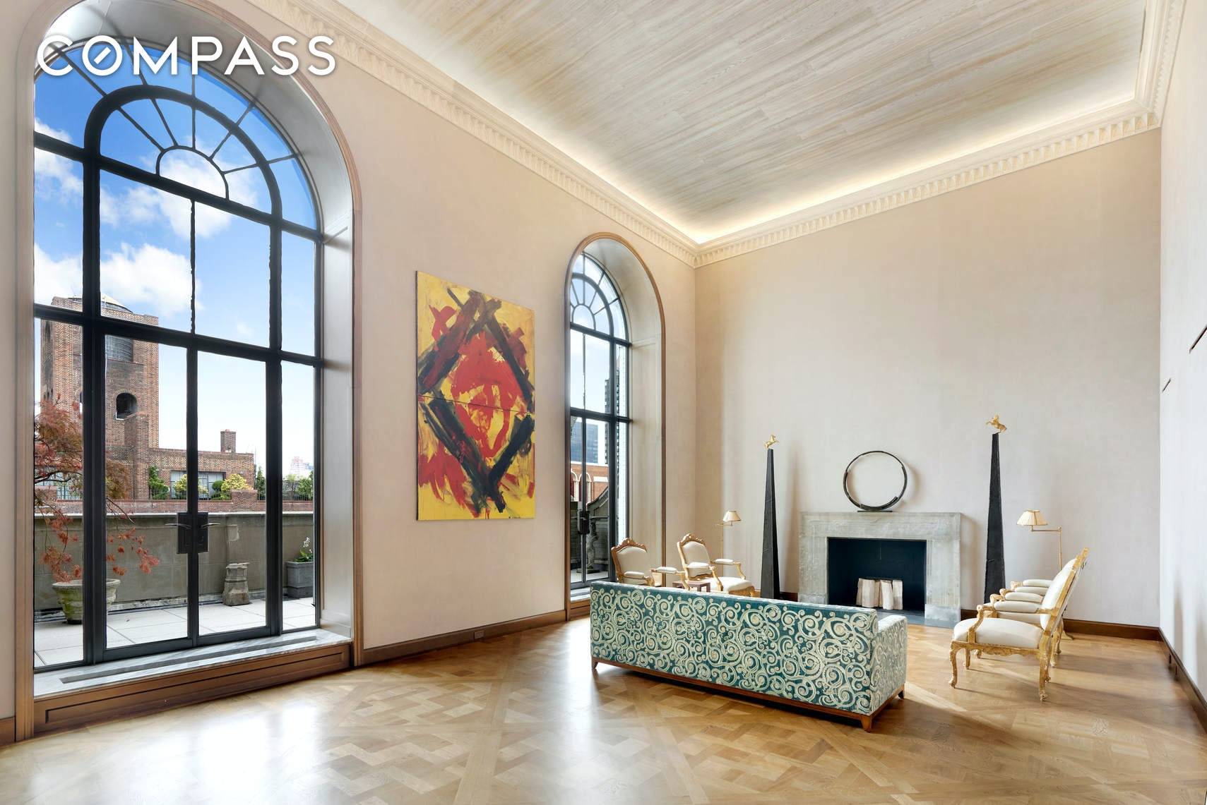 This dramatic duplex located in Sutton Place boasts architectural details and open city views through spectacular oversized windows.