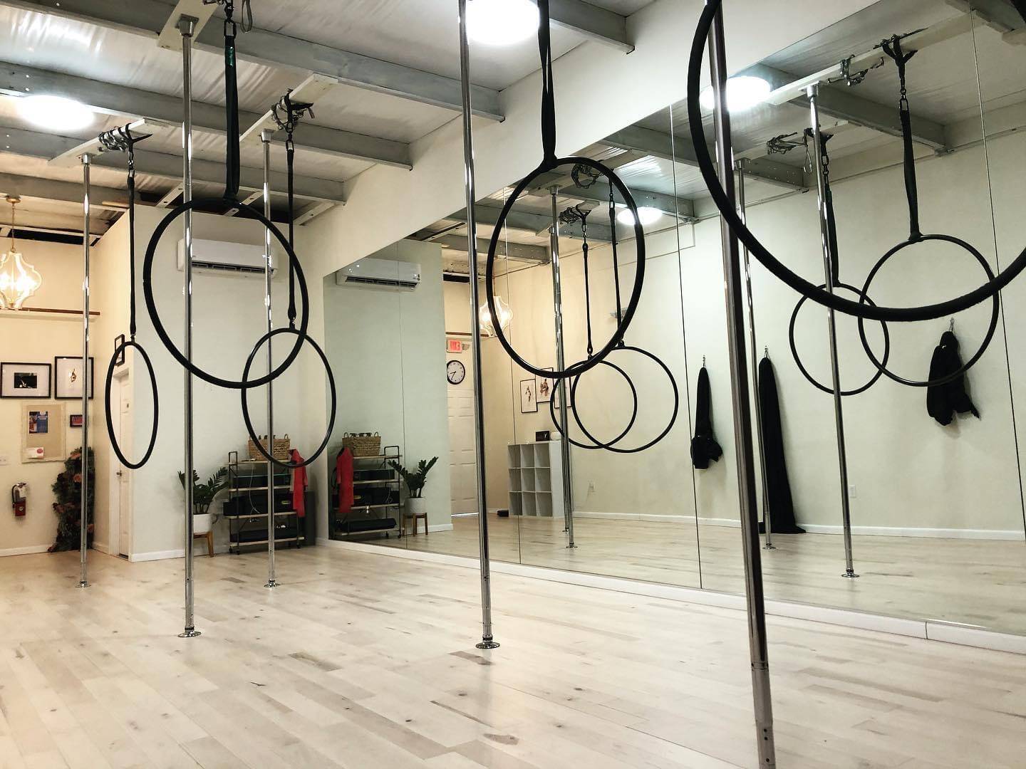The Studio is a small space with amazing energy with 5 stainless Poles, 5 Silks, 5 hammocks, 5 hoops, 5 crash mats.