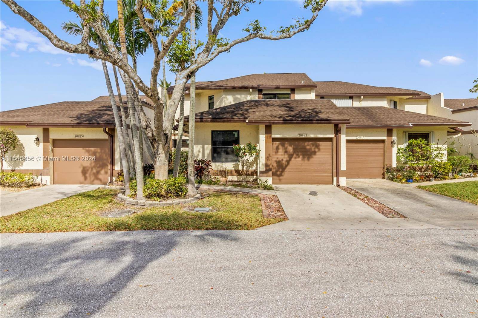 Welcome home to the highly sought after gated community of Boca Ridge Glen !