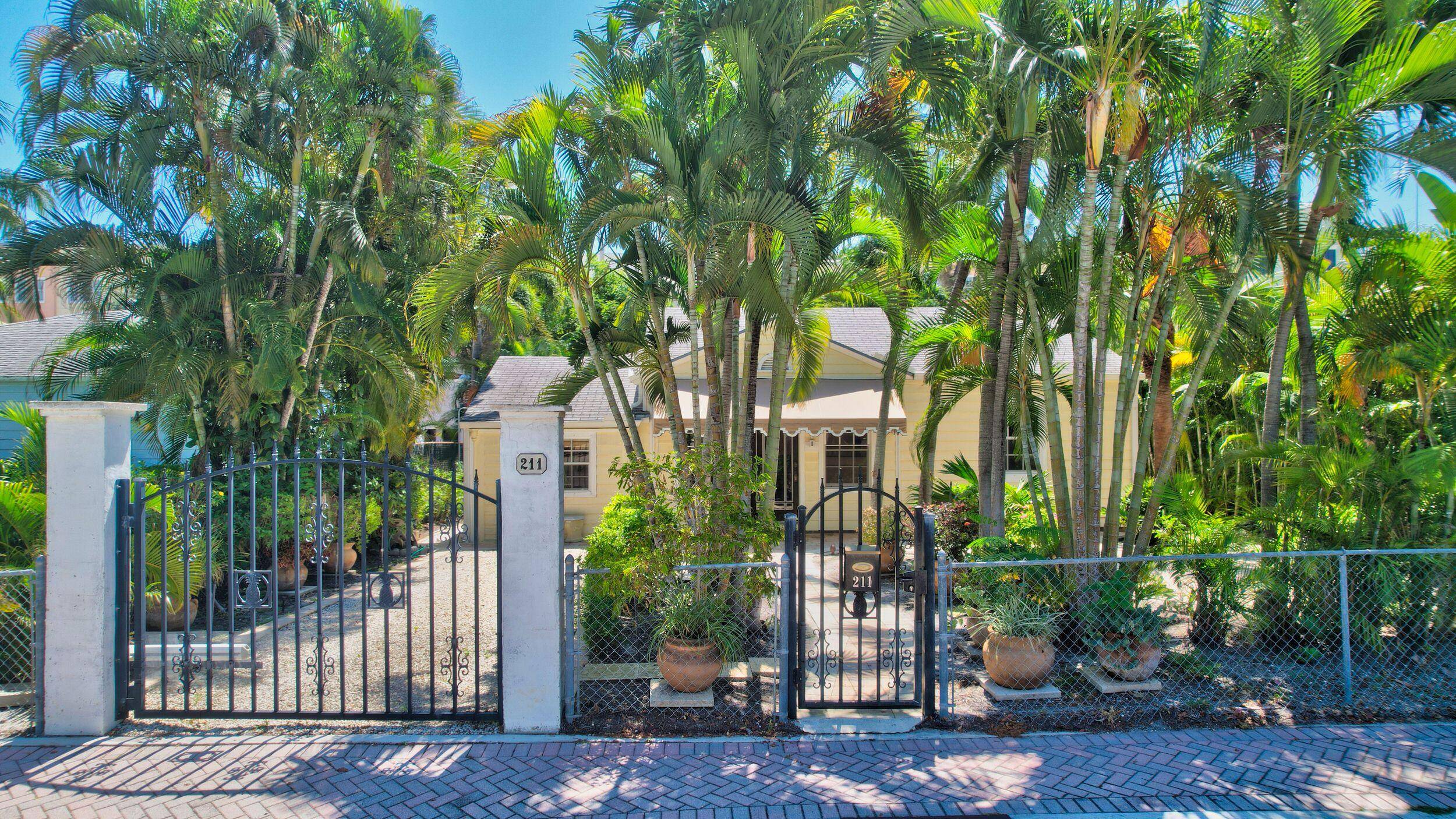 Original historic cottage home and lot in the famous downtown area of Delray Beach.