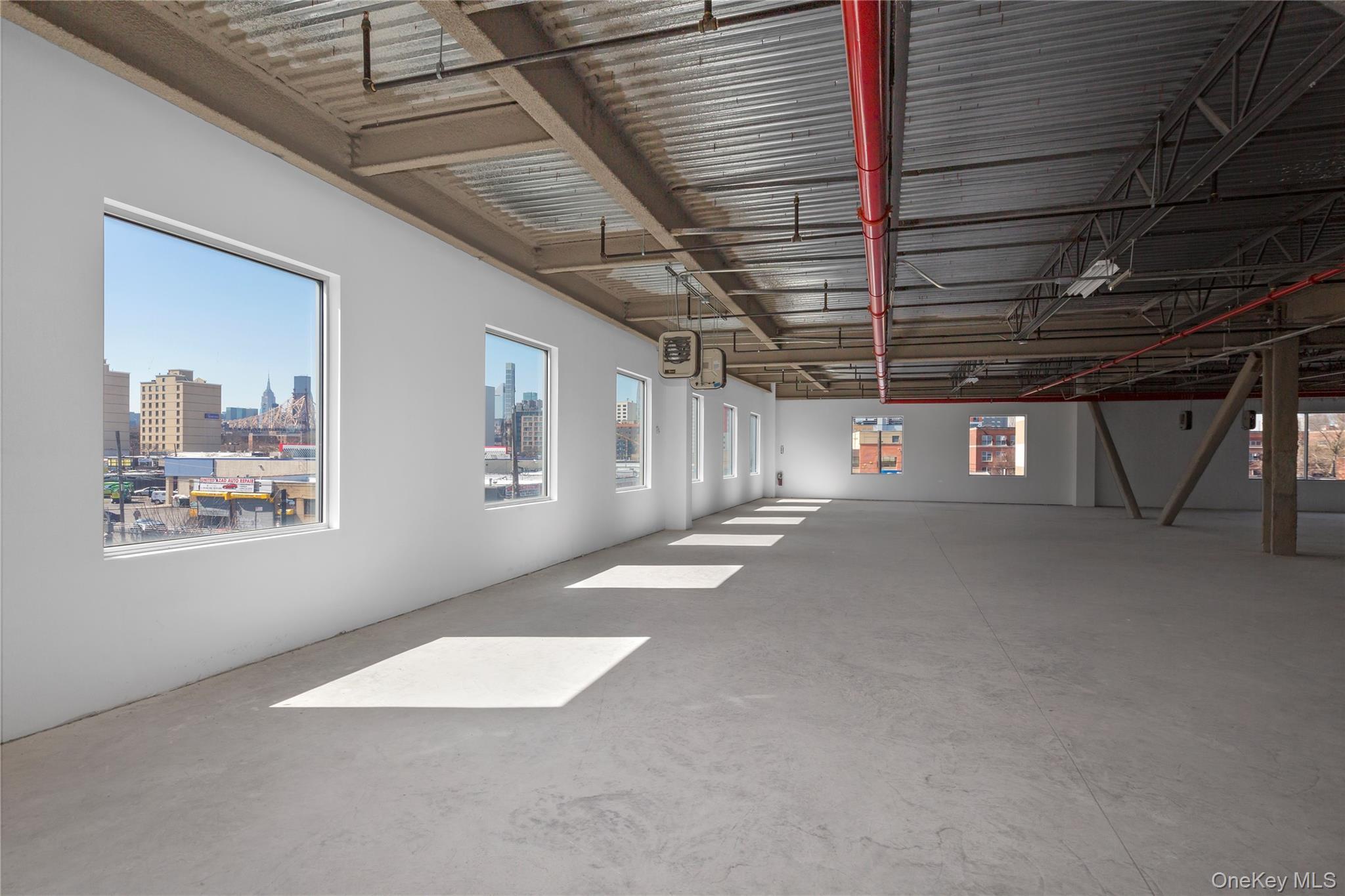 Unfurnished room featuring a city view