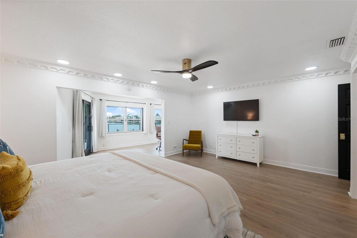Spacious Master suite w/ water views and private terrace access