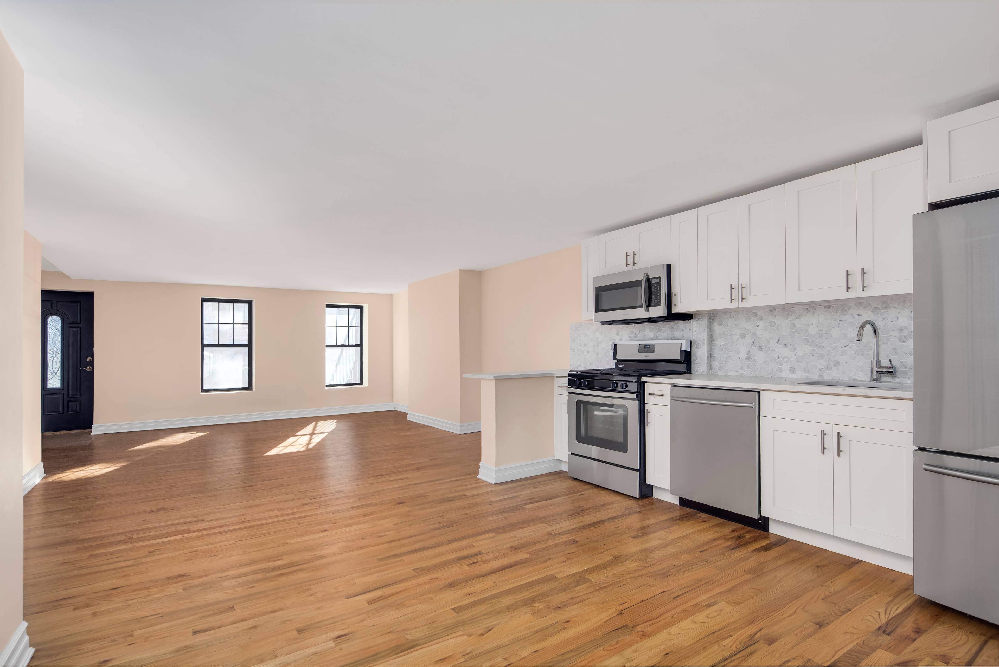 Enormous, spacious and fully renovated 2 bedroom, 2 bathroom rec room apartment that offers amazing natural sunlight through its large windows.