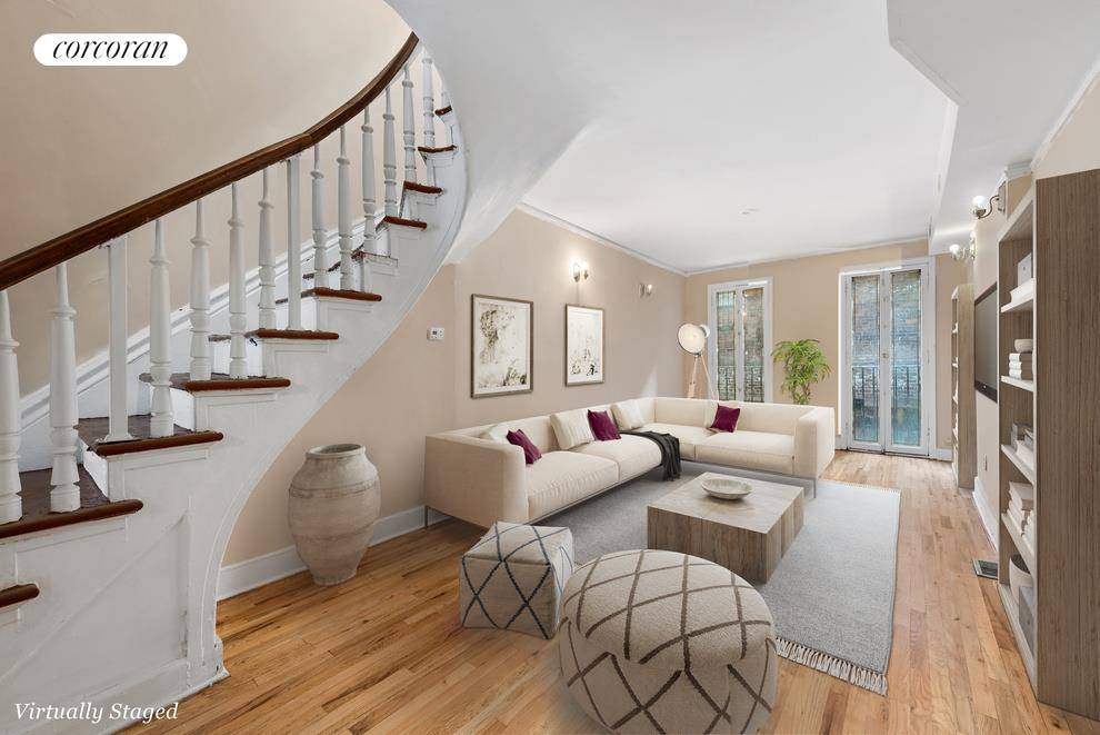 This sprawling townhouse has 3 4 bedrooms over three levels of living plus a formal dining room and bonus office room.