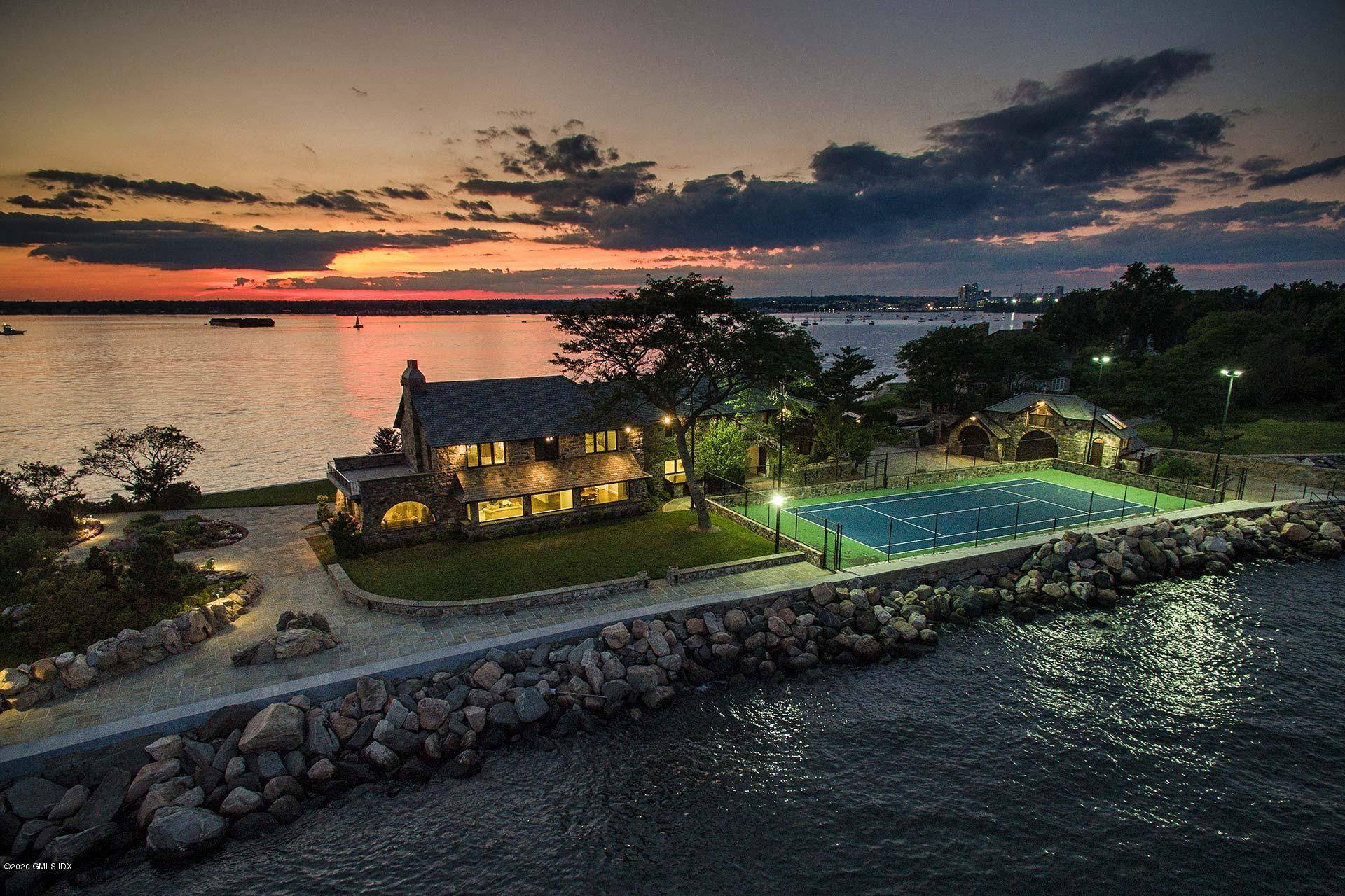 Surrounded by Long Island Sound on 3 sides, this 5, 497 SF waterfront compound has defined the southern tip of Shippan Point for over a century.