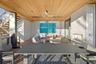 Office featuring floor to ceiling windows, ceiling fan, and wood ceiling