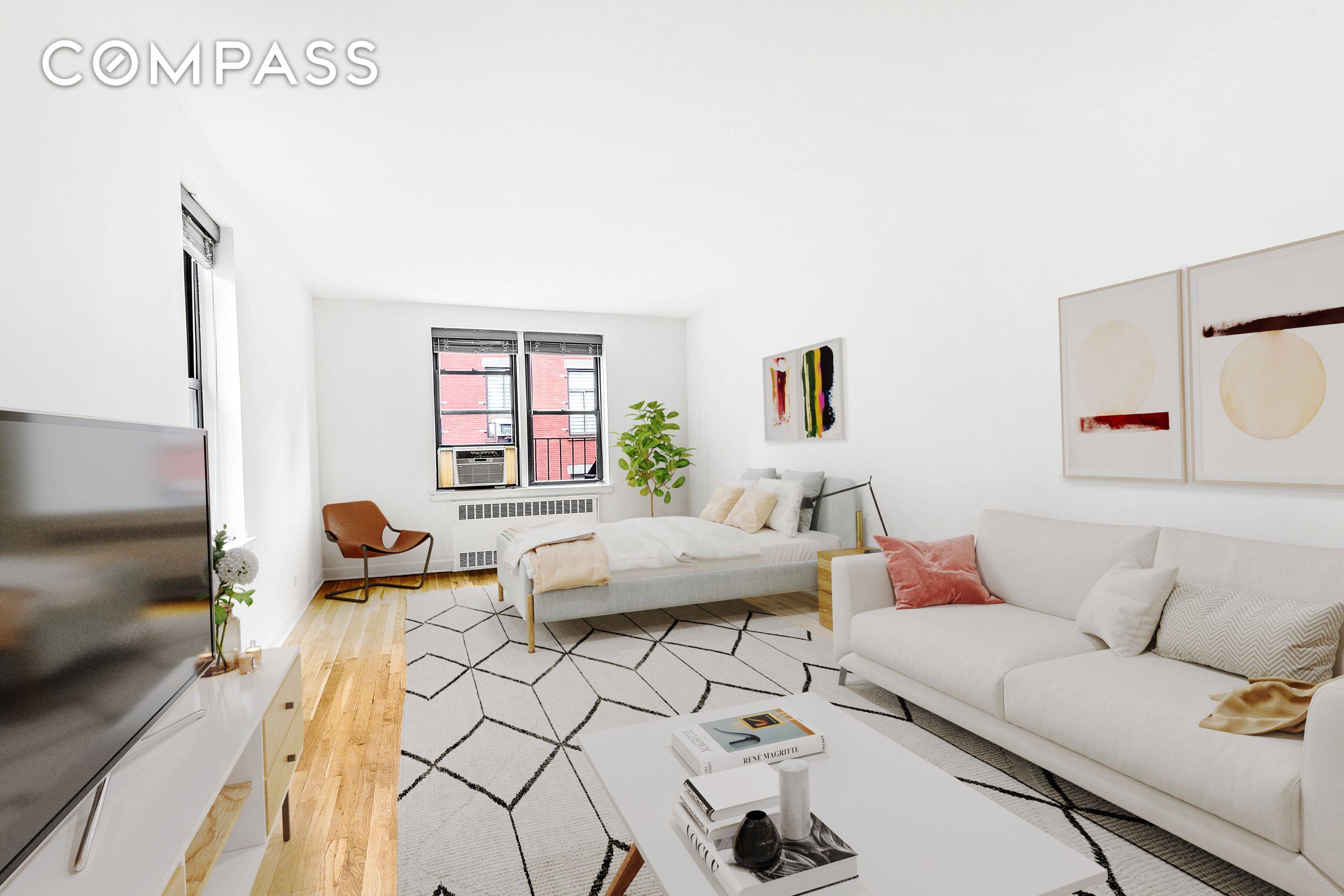 Large and bright, top floor, studio available for rent in prime Greenwich Village location.