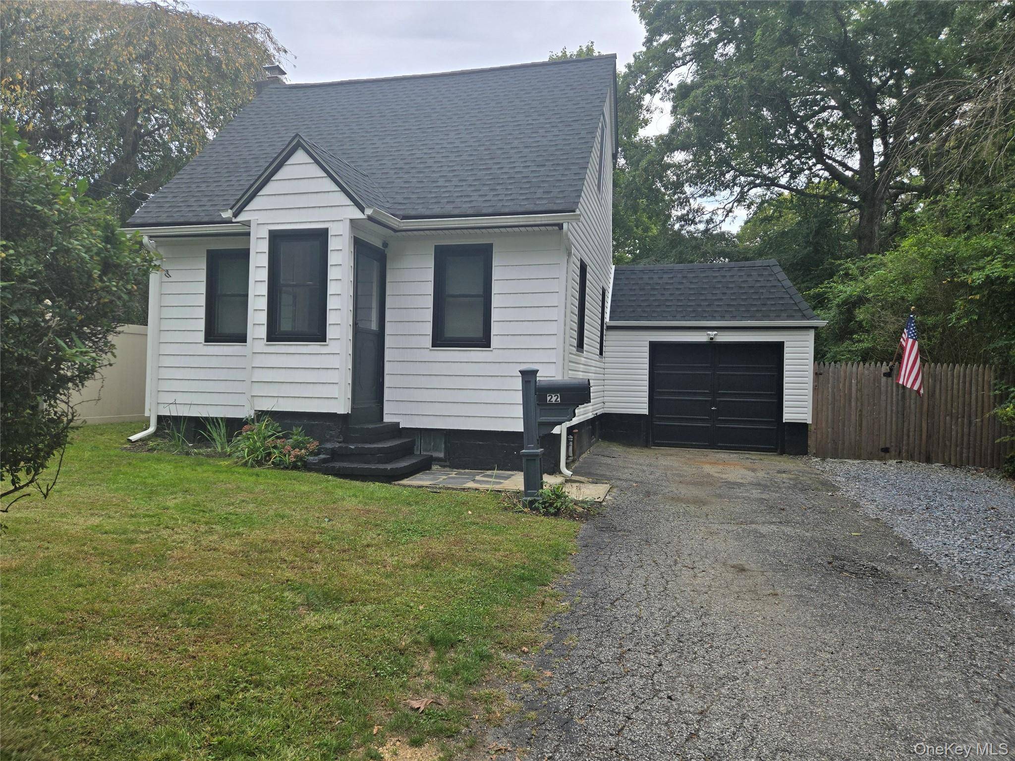 Charming home in Saint James with additional lot totaling 1 4 acre of fully fenced property with low, low taxes.