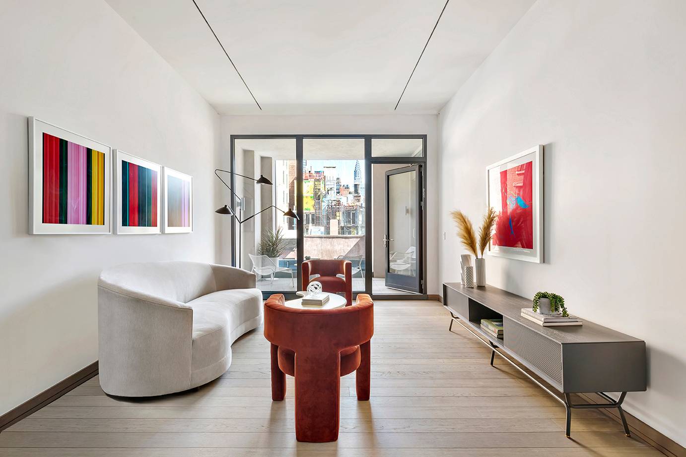 Jumbo one bedroom, one and a half bath residence features dramatic 10 4 ceilings, oversized windows with northern exposures, and a private terrace with city views of the Chrysler Building.
