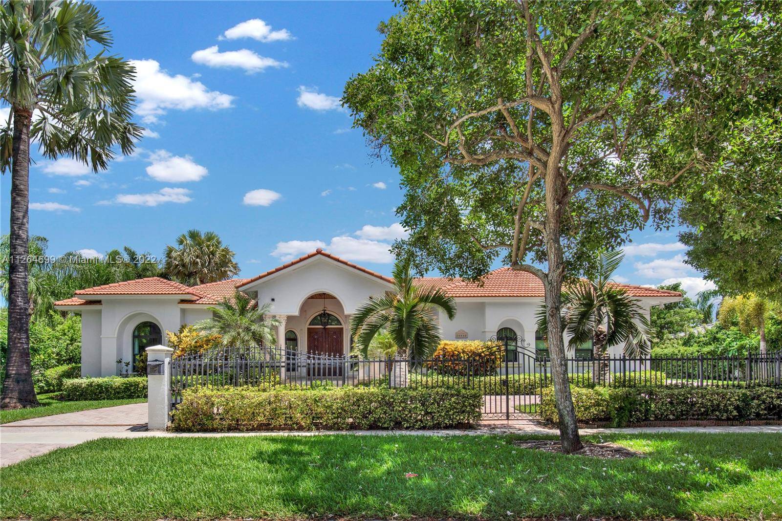 Welcome to this fabulous gated residence, boasting a grand entrance with exquisite wood double doors and stunning marble floors in the foyer.