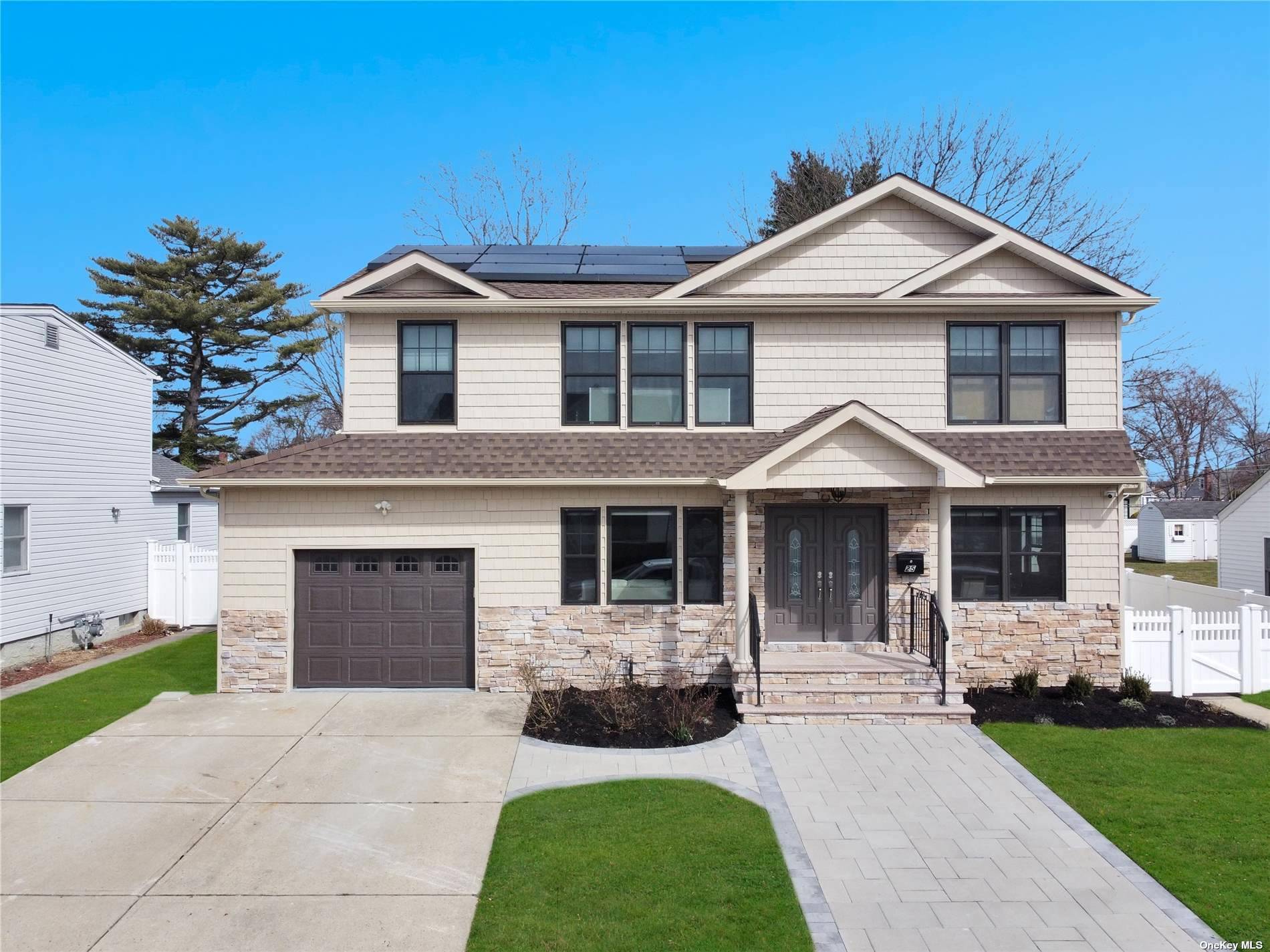 Presenting an exquisite new build on a generous lot in Hicksville.
