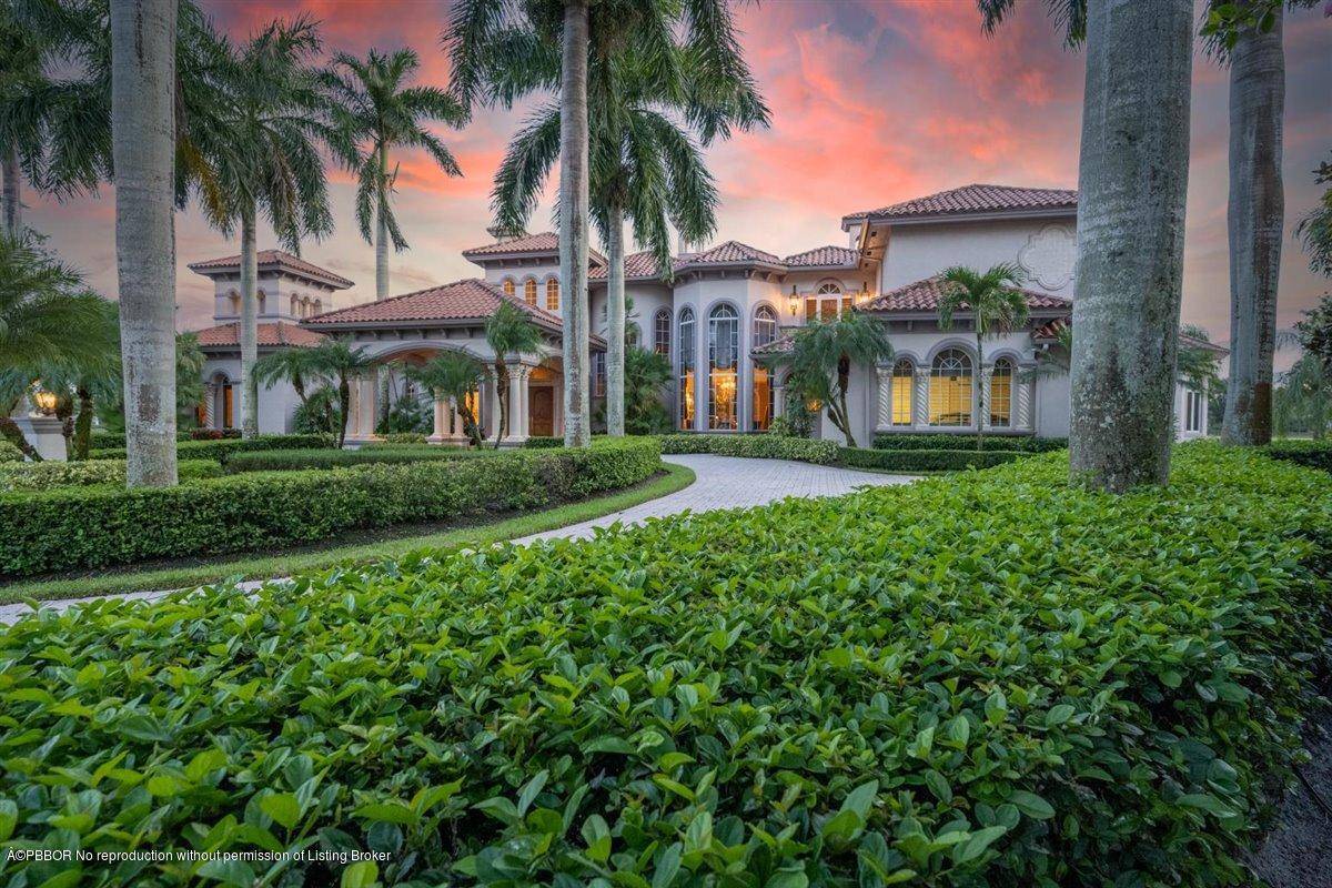 Extraordinary custom estate constructed by Cribb Construction sitting upon one of the most breathtaking pieces of property throughout all of Palm Beach County.
