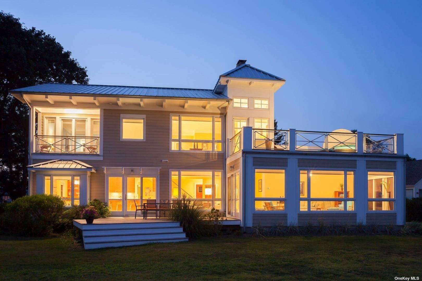 Beachfront, located in Southold Shores, this architect's own home is built with all the beautiful appointments you can imagine.