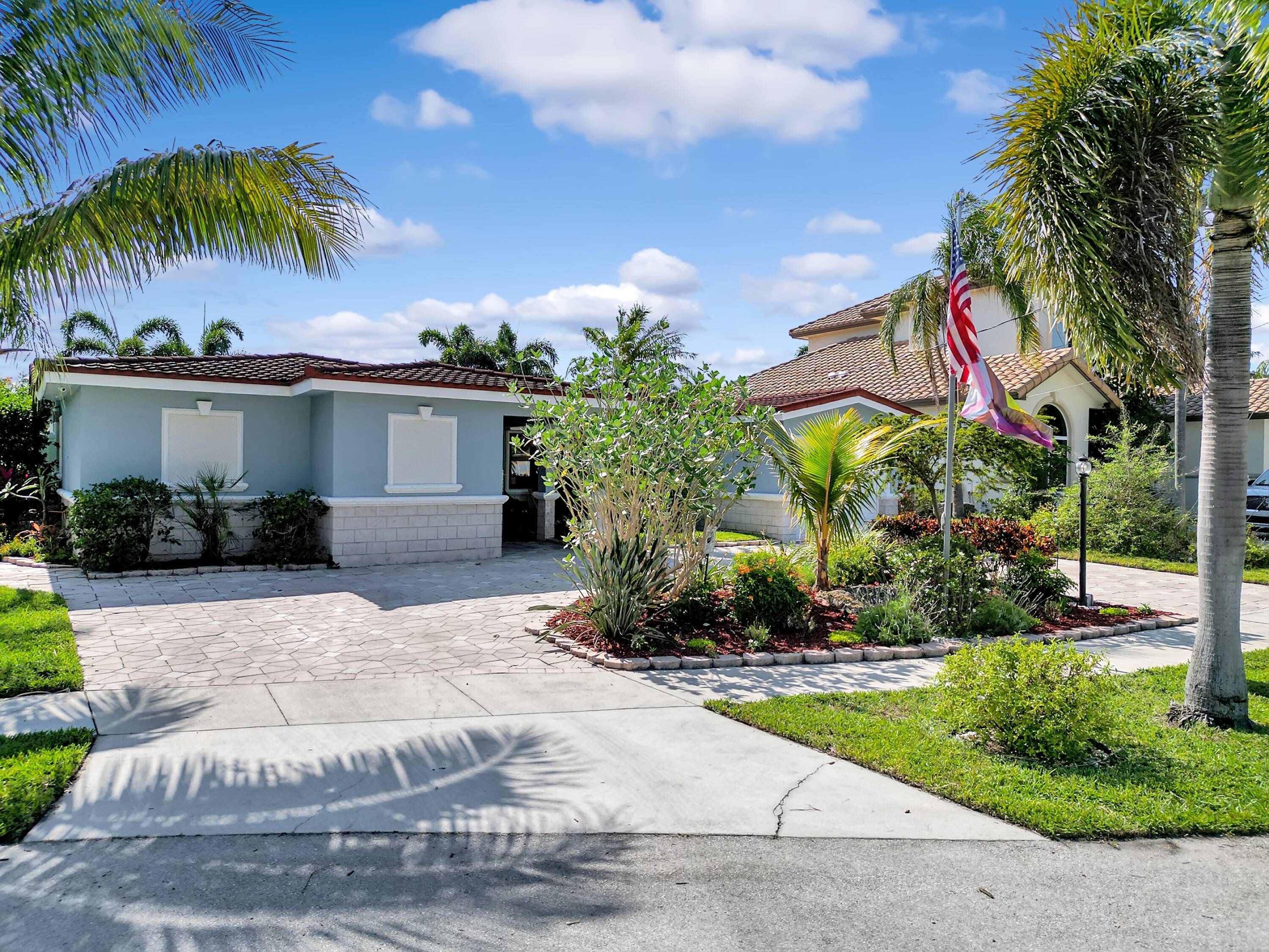 Introducing a magnificent waterfront retreat nestled in the exclusive boaters' dream location of Deerfield Beach's prestigious Cove neighborhood.