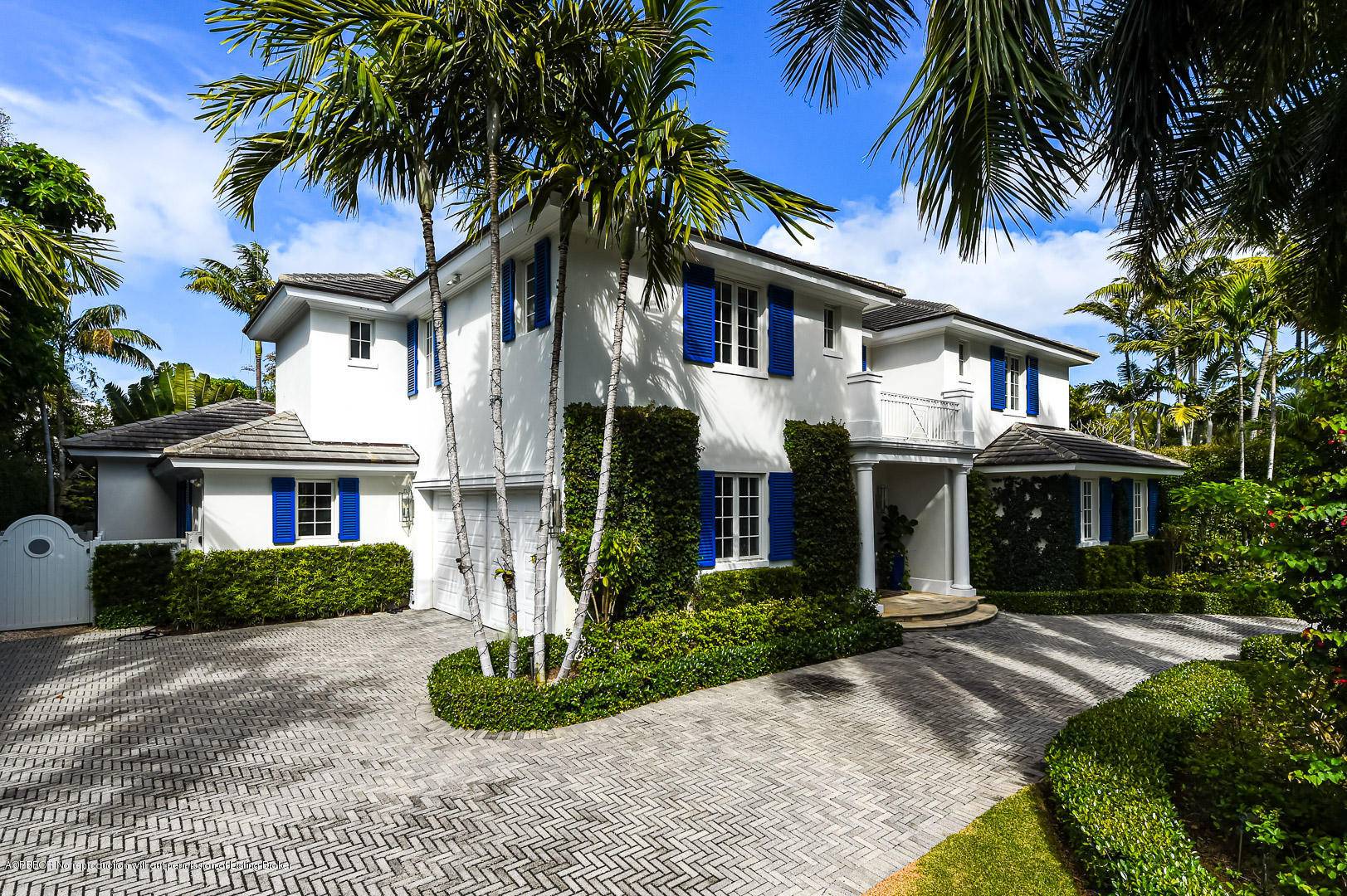 Gorgeous, light and bright British Colonial built in 2008 with 6 bedrooms, 7 bathrooms, and 1 powder room.
