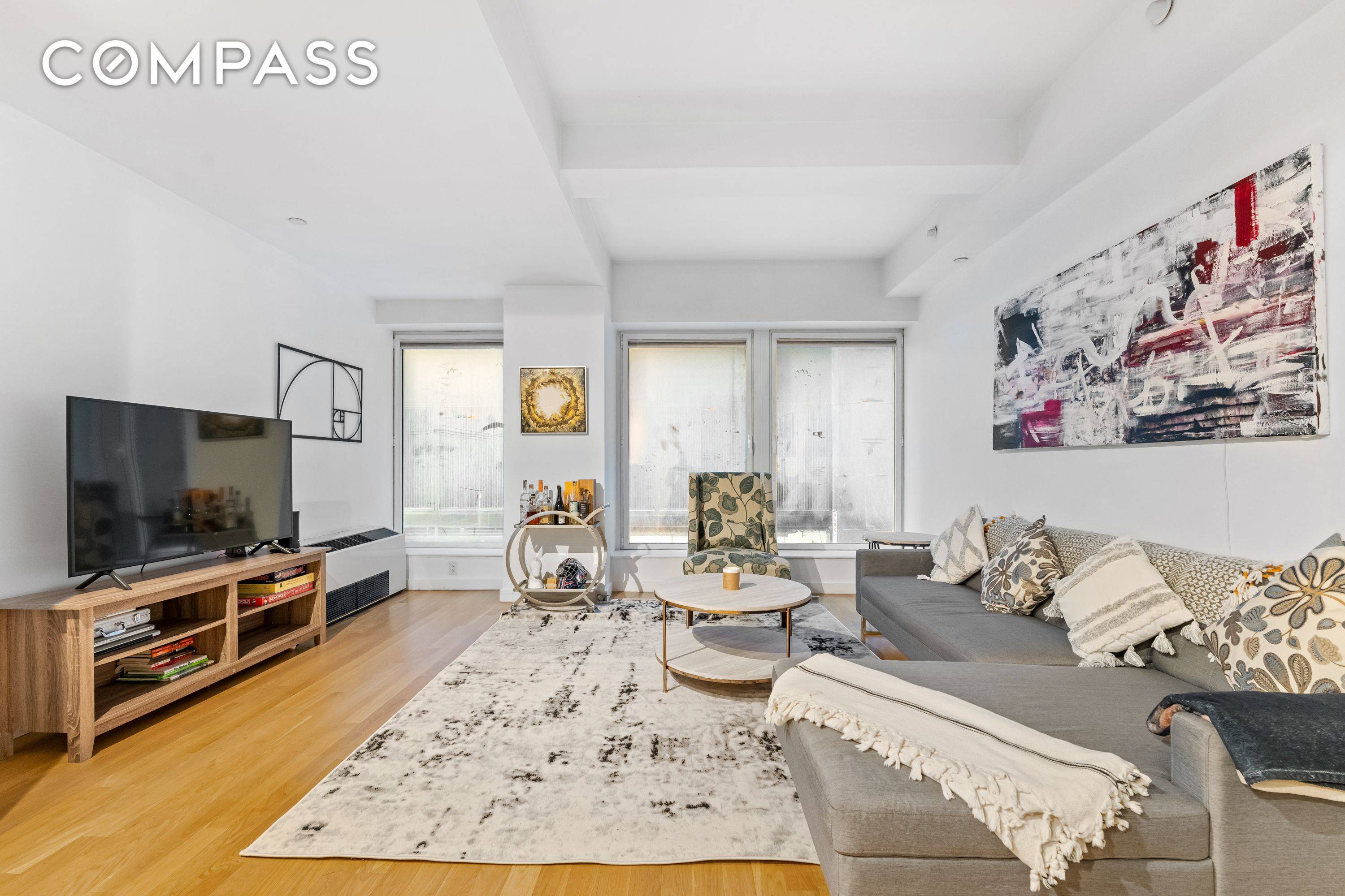 Welcome home to this beautiful and spacious loft currently set up as a 2 bedroom in a full amenity FiDi condo.