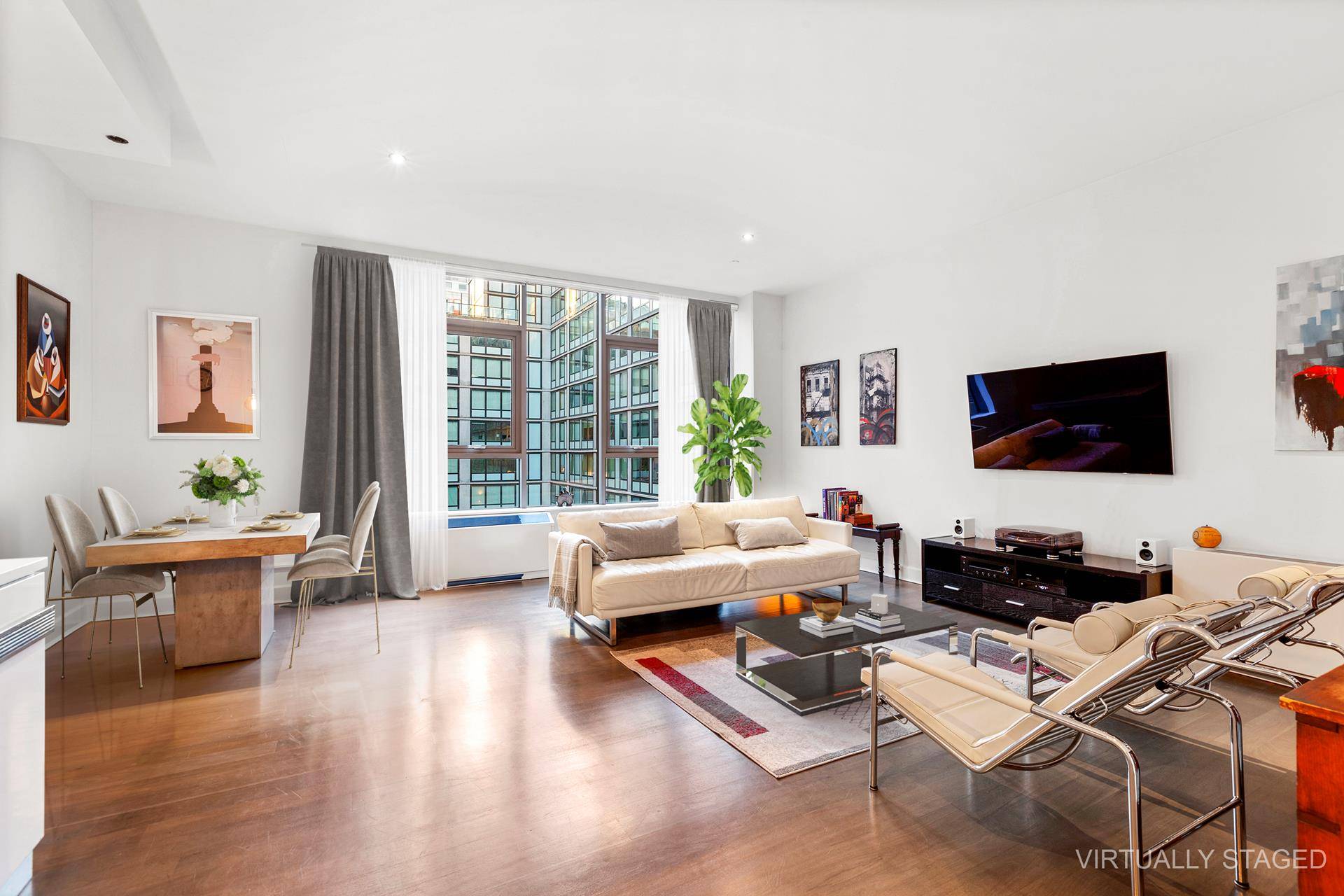 This oversized 2 bed 2 bath CORNER UNIT is one of the largest 2 bedroom units in all of Long Island City !