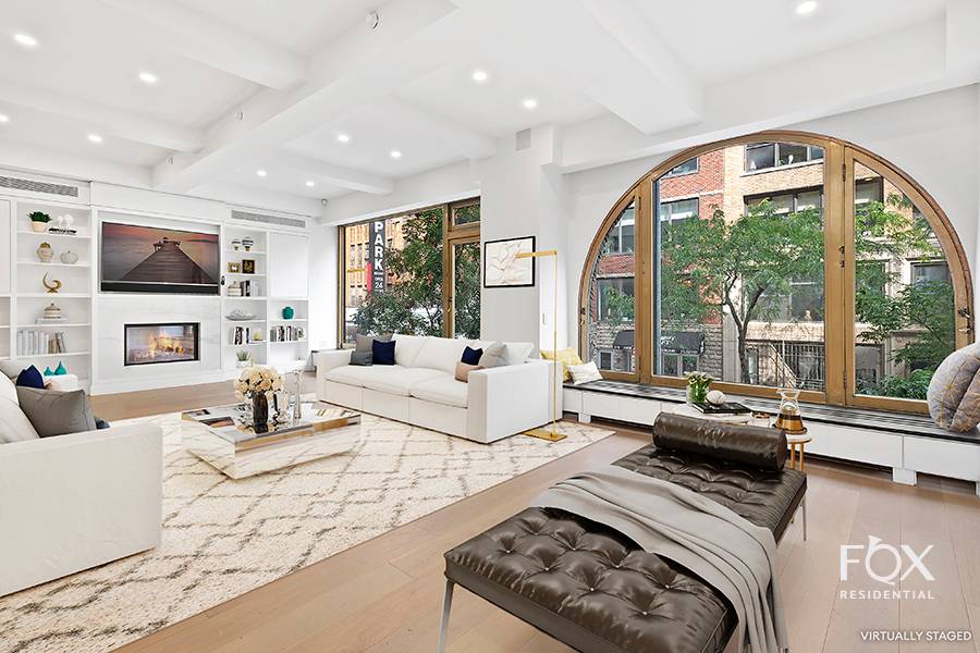 Comprising over 4, 100 square feet of sunny living space in one of Chelsea's most iconic prewar buildings, this stunning, mint condition loft includes three bedrooms, four and a half ...