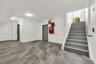 Stairway featuring baseboards