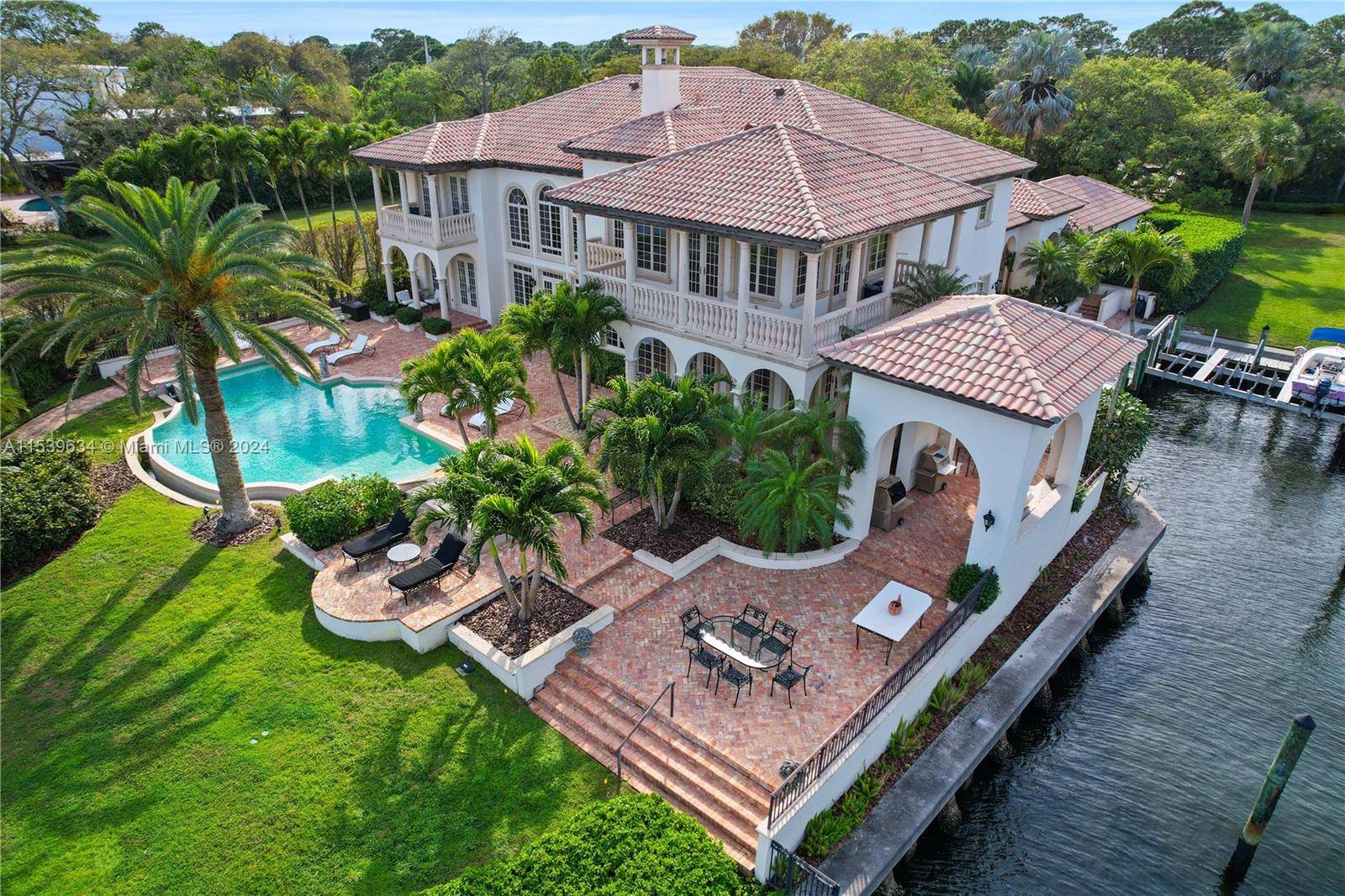 This real estate offering presents an exceptional opportunity to own a waterfront estate with over 2 acres of land and 300 feet of direct Intracoastal waterfront.