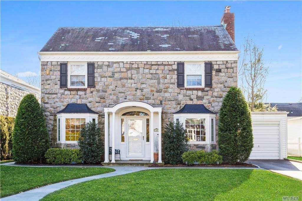 Gorgeous Curb Appeal ! Exquisitely Expanded Stone Center Hall Colonial Located In The Heart Of the Mott Section of Beautiful Garden City.