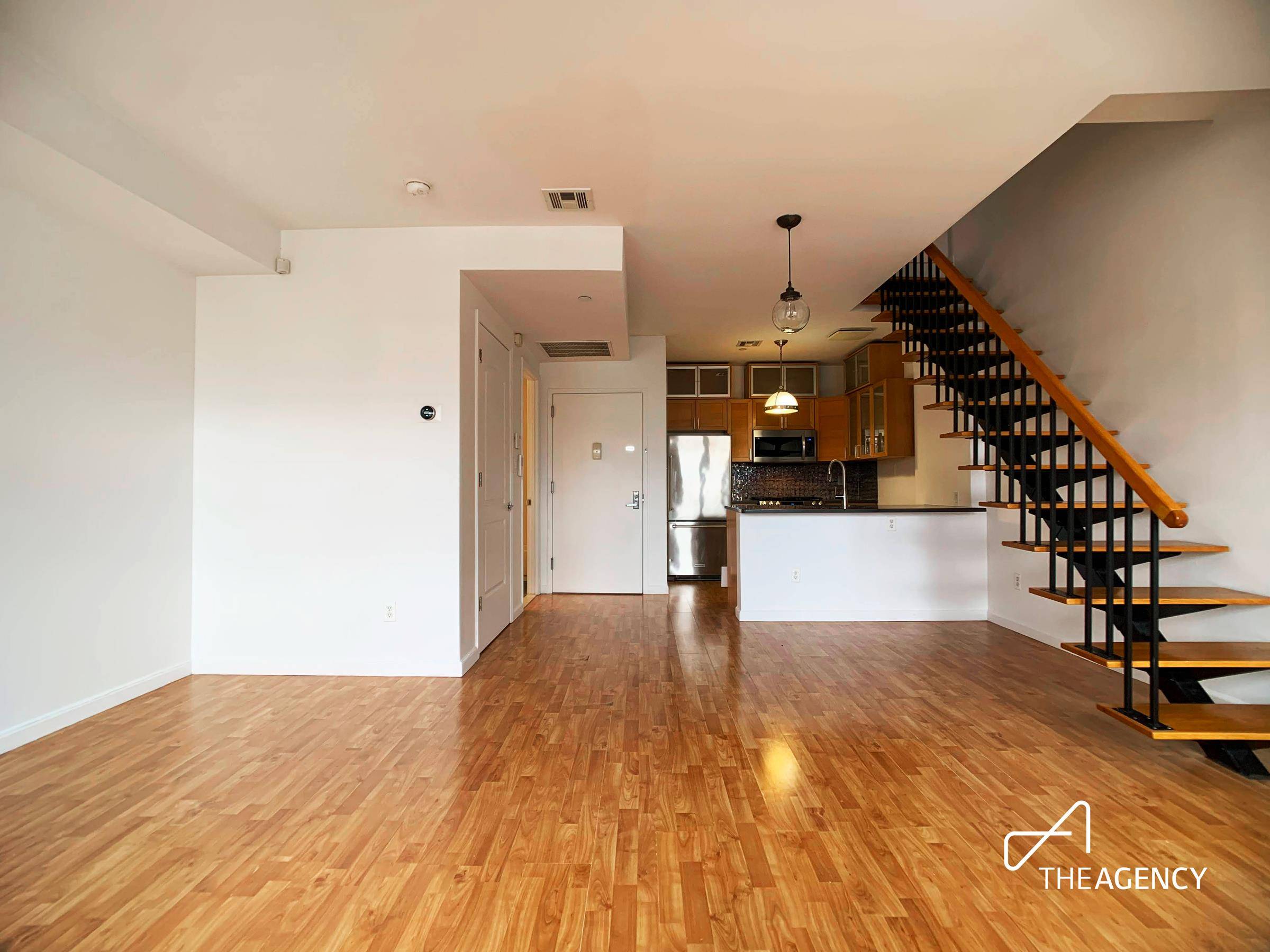 This unit 4B, the penthouse, is a 1 bedroom 1BR 2 bathroom 2BA duplex unit designed perfectly with an open concept downstairs, an extra half bedroom office upstairs, access to ...