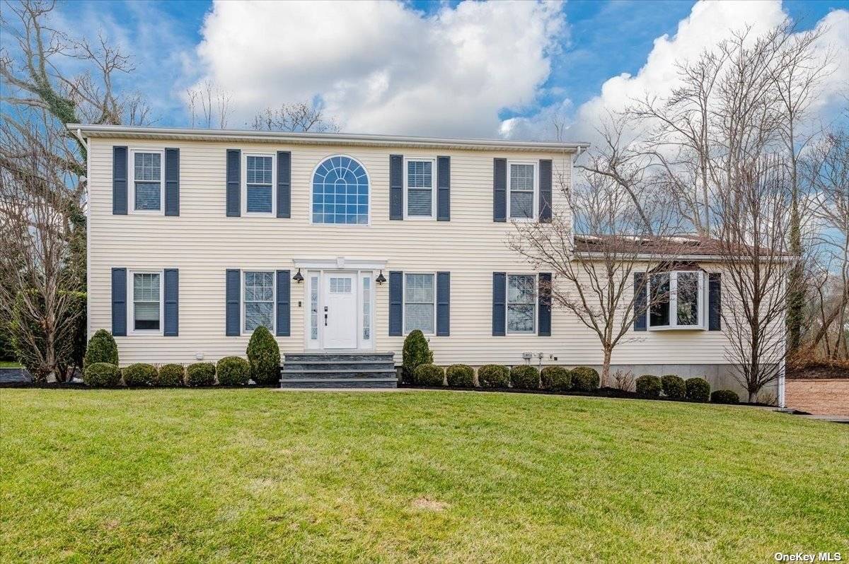 Completely remodeled to perfection, indulge in luxury living in this immaculate Young Colonial nestled in the heart of Port Jefferson Village.