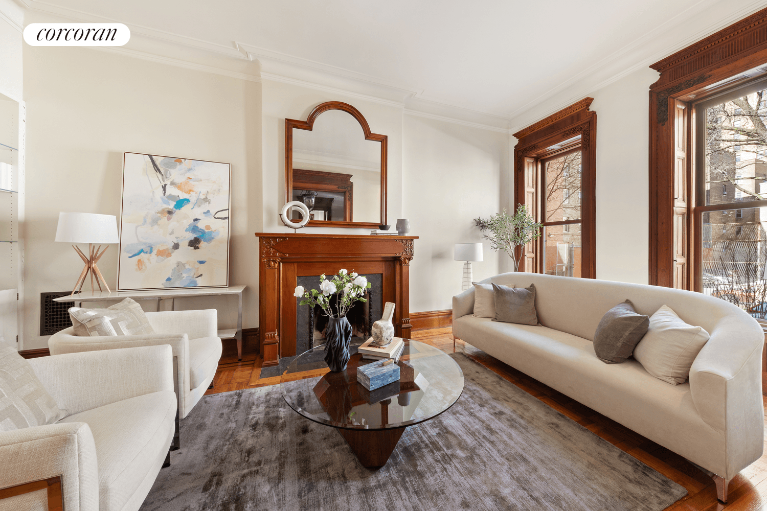 Situated mid block on this distinctive Upper West Side brownstone street, this elegant and sun flooded 18.