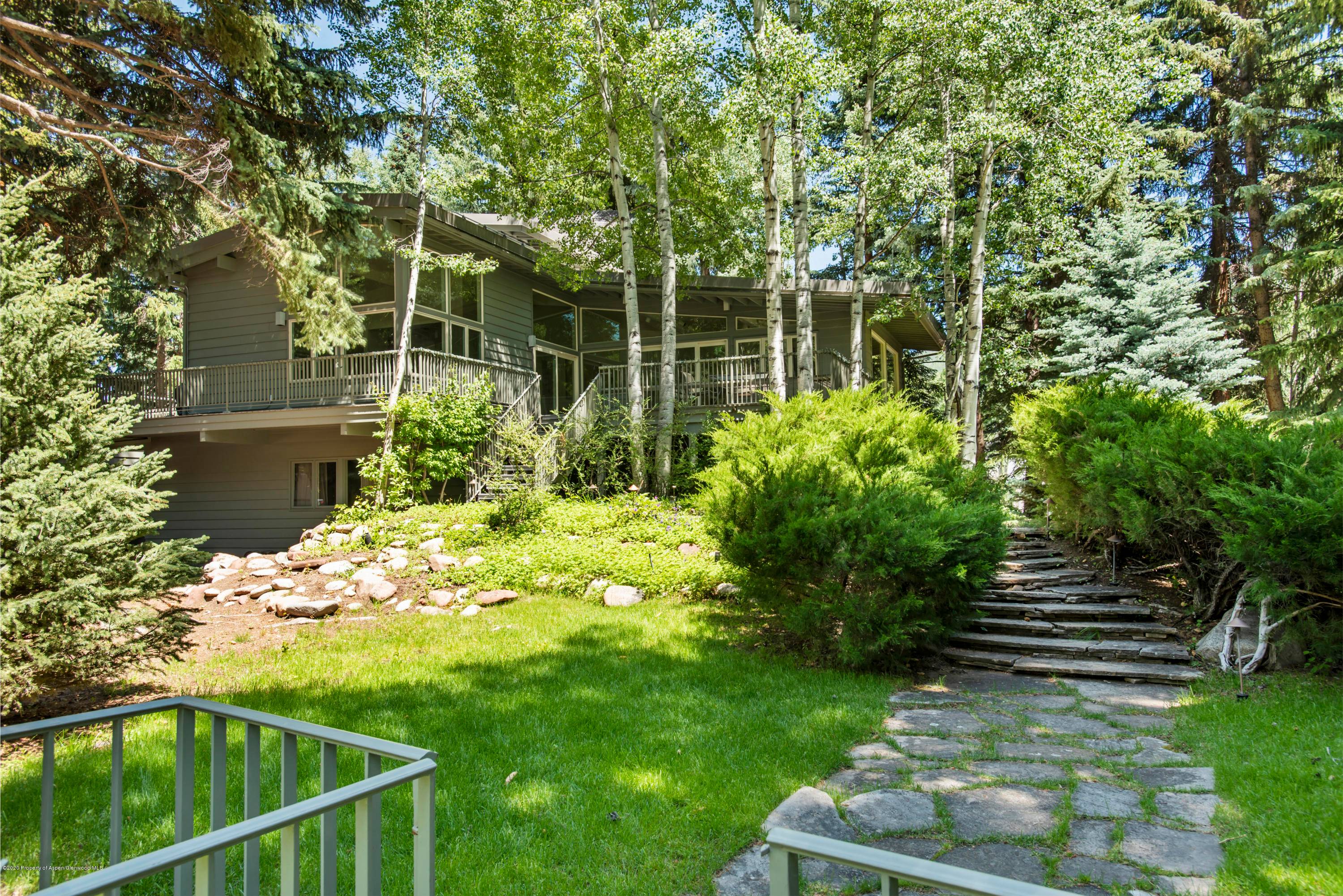This gem sits on a large secluded lot located in Aspen's West End, one block from the Aspen Institute and Aspen Music Festival.