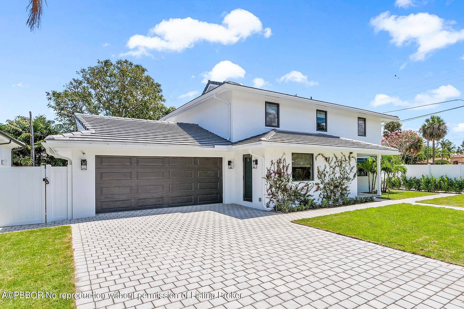 Nestled in the sought after SoSo neighborhood of West Palm Beach, this 5 bedroom 4 bathroom home, renovated by Caroline Rafferty Interiors, offers a spacious layout.