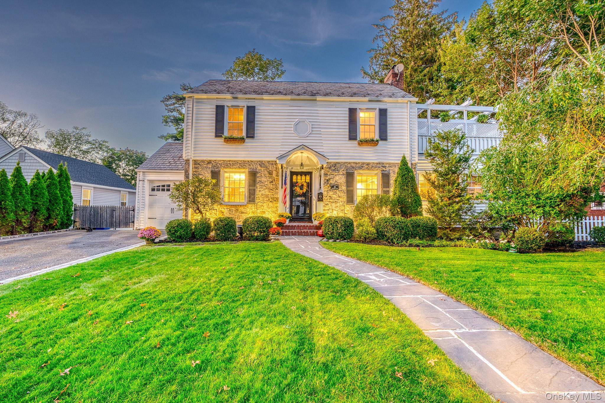 Welcome to this much sought after Rockville Centre, Greystone Section Center Hall Colonial.