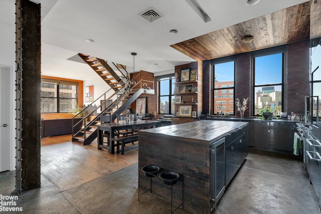 Duplex Corner Penthouse with Private RoofExperience a blend of classic charm and modern design in this recently remodeled loft boasting a myriad of exceptional features.